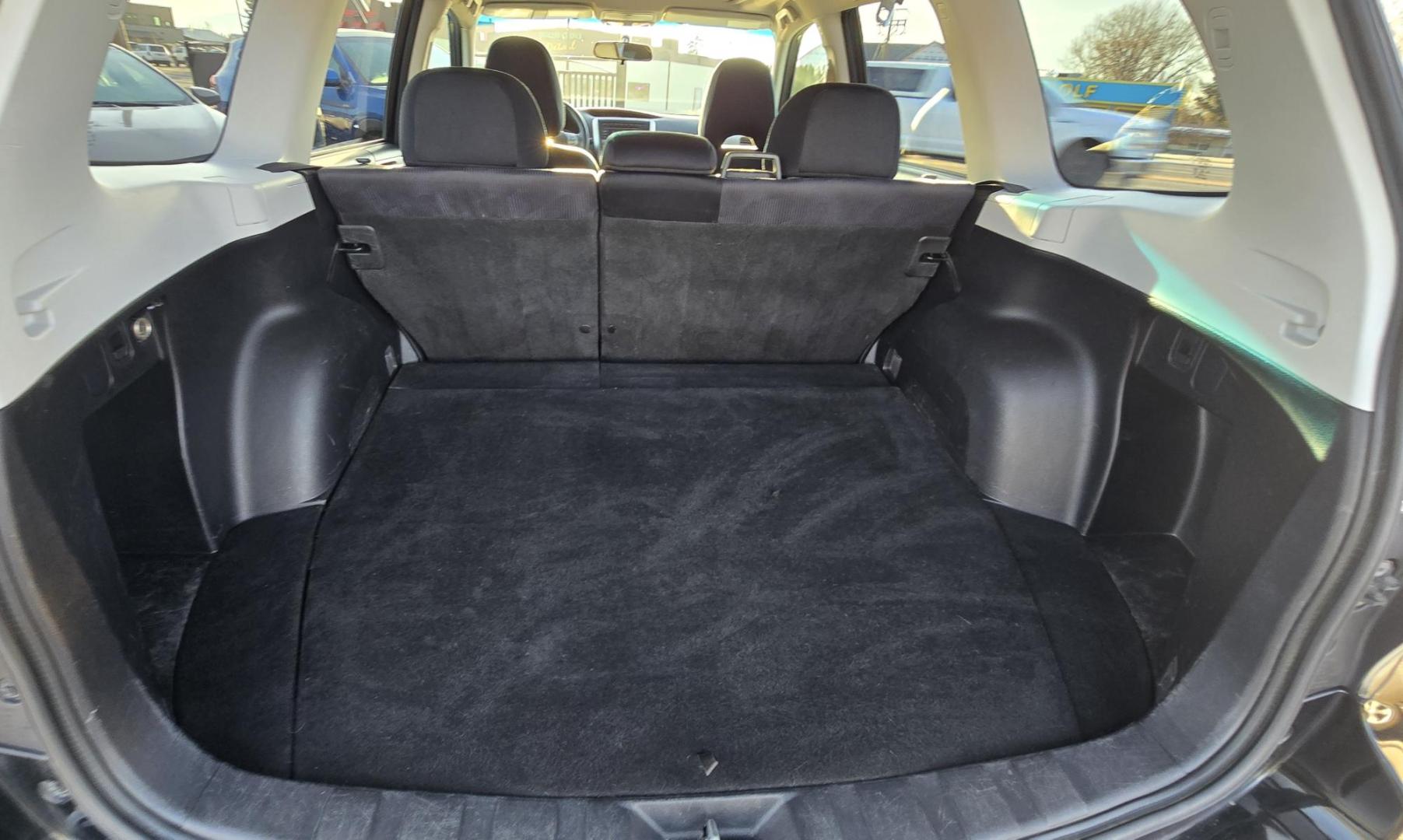 2009 Black /Grey Cloth Subaru Forester Premium (JF2SH63699H) with an 2.5L H4 SOHC 16V engine, 4-Speed Automatic transmission, located at 450 N Russell, Missoula, MT, 59801, (406) 543-6600, 46.874496, -114.017433 - Jet Black AWD Subaru. 2.5L Engine. Has all the necessary Subaru Maintenance. New Timing Belt. New Water Pump. New Head Gasket. New Radiator. Runs amazing. Automatic Transmission. Power Sunroof. Power Drivers Seat. Heated Front Seat.Air. Cruise. Tilt. Power Windows and Locks. Yokohama Tires. We Fin - Photo#6