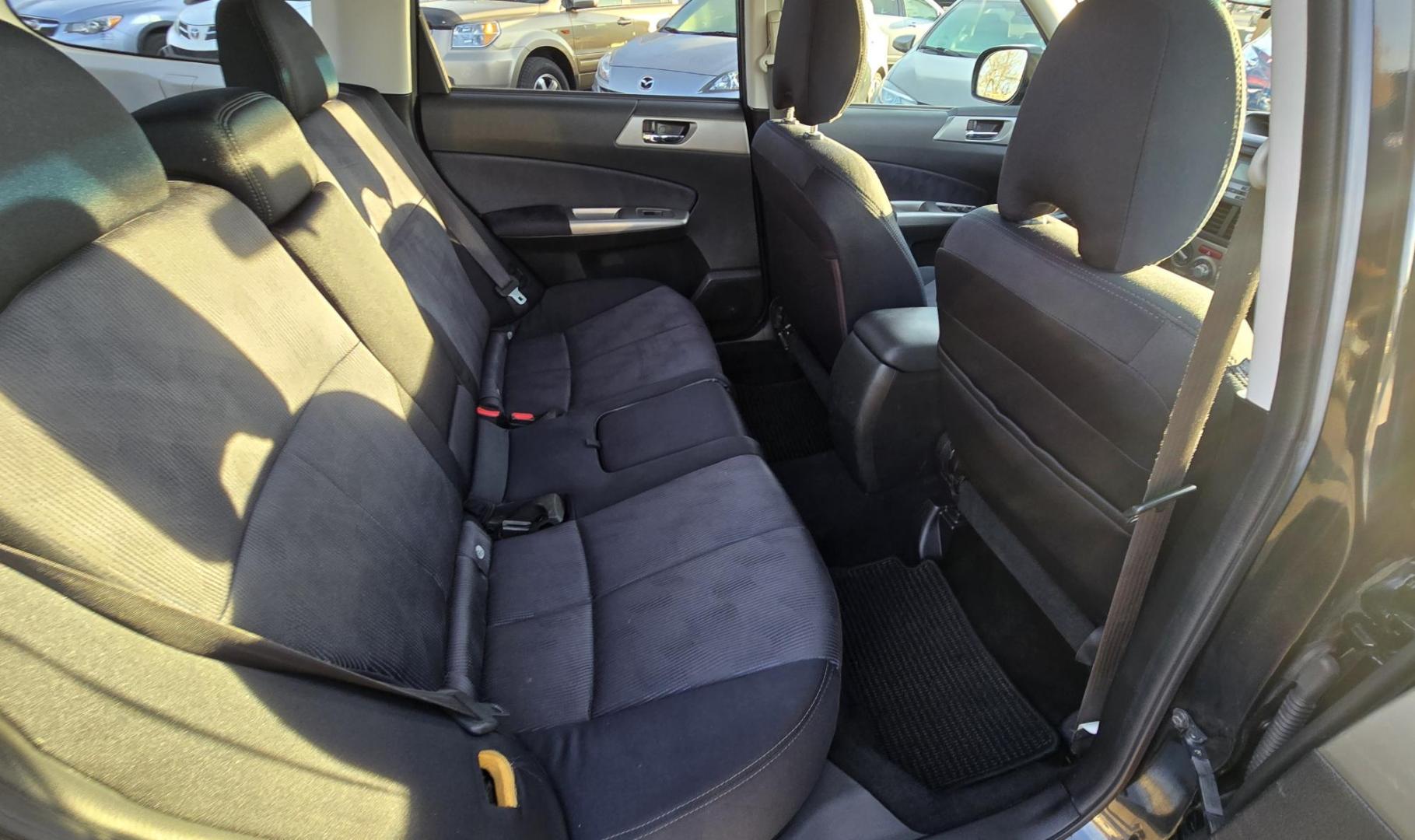 2009 Black /Grey Cloth Subaru Forester Premium (JF2SH63699H) with an 2.5L H4 SOHC 16V engine, 4-Speed Automatic transmission, located at 450 N Russell, Missoula, MT, 59801, (406) 543-6600, 46.874496, -114.017433 - Jet Black AWD Subaru. 2.5L Engine. Has all the necessary Subaru Maintenance. New Timing Belt. New Water Pump. New Head Gasket. New Radiator. Runs amazing. Automatic Transmission. Power Sunroof. Power Drivers Seat. Heated Front Seat.Air. Cruise. Tilt. Power Windows and Locks. Yokohama Tires. We Fin - Photo#7