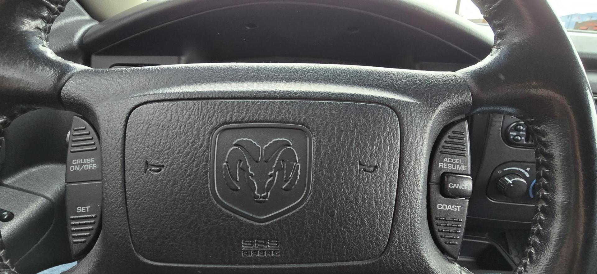 2003 Blue /Gray Dodge Dakota SLT (1D7HG48N63S) with an 4.7L V8 SOHC 16V engine, Automatic with Overdrive transmission, located at 450 N Russell, Missoula, MT, 59801, (406) 543-6600, 46.874496, -114.017433 - Nice mid-size 4WD. 4.7l V8 Offers Power and Economy. Automatic Transmission. Air. Cruise. Tilt. Power Windows and Locks.AM FM CD Player. Excellent Tires. Has a dent on the passenger side and the Center arm Rest is Missing. Because of the age of this vehicle, our lenders do NOT offer financing. - Photo#14