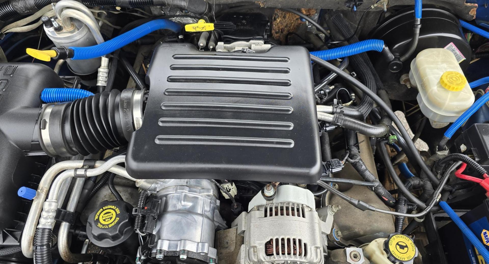 2003 Blue /Gray Dodge Dakota SLT (1D7HG48N63S) with an 4.7L V8 SOHC 16V engine, Automatic with Overdrive transmission, located at 450 N Russell, Missoula, MT, 59801, (406) 543-6600, 46.874496, -114.017433 - Nice mid-size 4WD. 4.7l V8 Offers Power and Economy. Automatic Transmission. Air. Cruise. Tilt. Power Windows and Locks.AM FM CD Player. Excellent Tires. Has a dent on the passenger side and the Center arm Rest is Missing. Because of the age of this vehicle, our lenders do NOT offer financing. - Photo#16