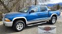 2003 Blue /Gray Dodge Dakota SLT (1D7HG48N63S) with an 4.7L V8 SOHC 16V engine, Automatic with Overdrive transmission, located at 450 N Russell, Missoula, MT, 59801, (406) 543-6600, 46.874496, -114.017433 - Nice mid-size 4WD. 4.7l V8 Offers Power and Economy. Automatic Transmission. Air. Cruise. Tilt. Power Windows and Locks.AM FM CD Player. Excellent Tires. Has a dent on the passenger side and the Center arm Rest is Missing. Because of the age of this vehicle, our lenders do NOT offer financing. - Photo#0