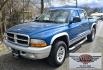 2003 Blue /Gray Dodge Dakota SLT (1D7HG48N63S) with an 4.7L V8 SOHC 16V engine, Automatic with Overdrive transmission, located at 450 N Russell, Missoula, MT, 59801, (406) 543-6600, 46.874496, -114.017433 - Nice mid-size 4WD. 4.7l V8 Offers Power and Economy. Automatic Transmission. Air. Cruise. Tilt. Power Windows and Locks.AM FM CD Player. Excellent Tires. Has a dent on the passenger side and the Center arm Rest is Missing. Because of the age of this vehicle, our lenders do NOT offer financing. - Photo#4
