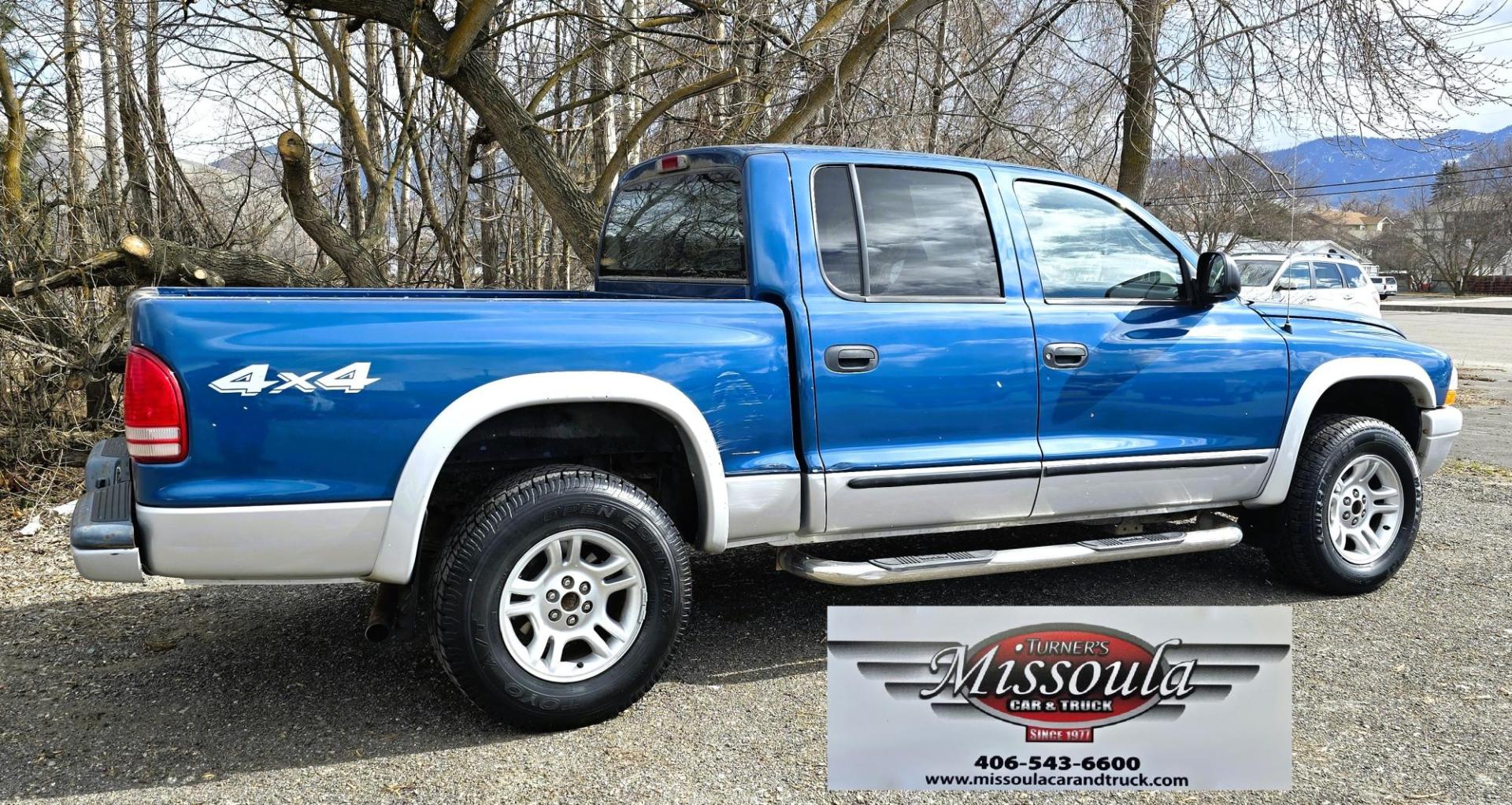 2003 Blue /Gray Dodge Dakota SLT (1D7HG48N63S) with an 4.7L V8 SOHC 16V engine, Automatic with Overdrive transmission, located at 450 N Russell, Missoula, MT, 59801, (406) 543-6600, 46.874496, -114.017433 - Nice mid-size 4WD. 4.7l V8 Offers Power and Economy. Automatic Transmission. Air. Cruise. Tilt. Power Windows and Locks.AM FM CD Player. Excellent Tires. Has a dent on the passenger side and the Center arm Rest is Missing. Because of the age of this vehicle, our lenders do NOT offer financing. - Photo#6