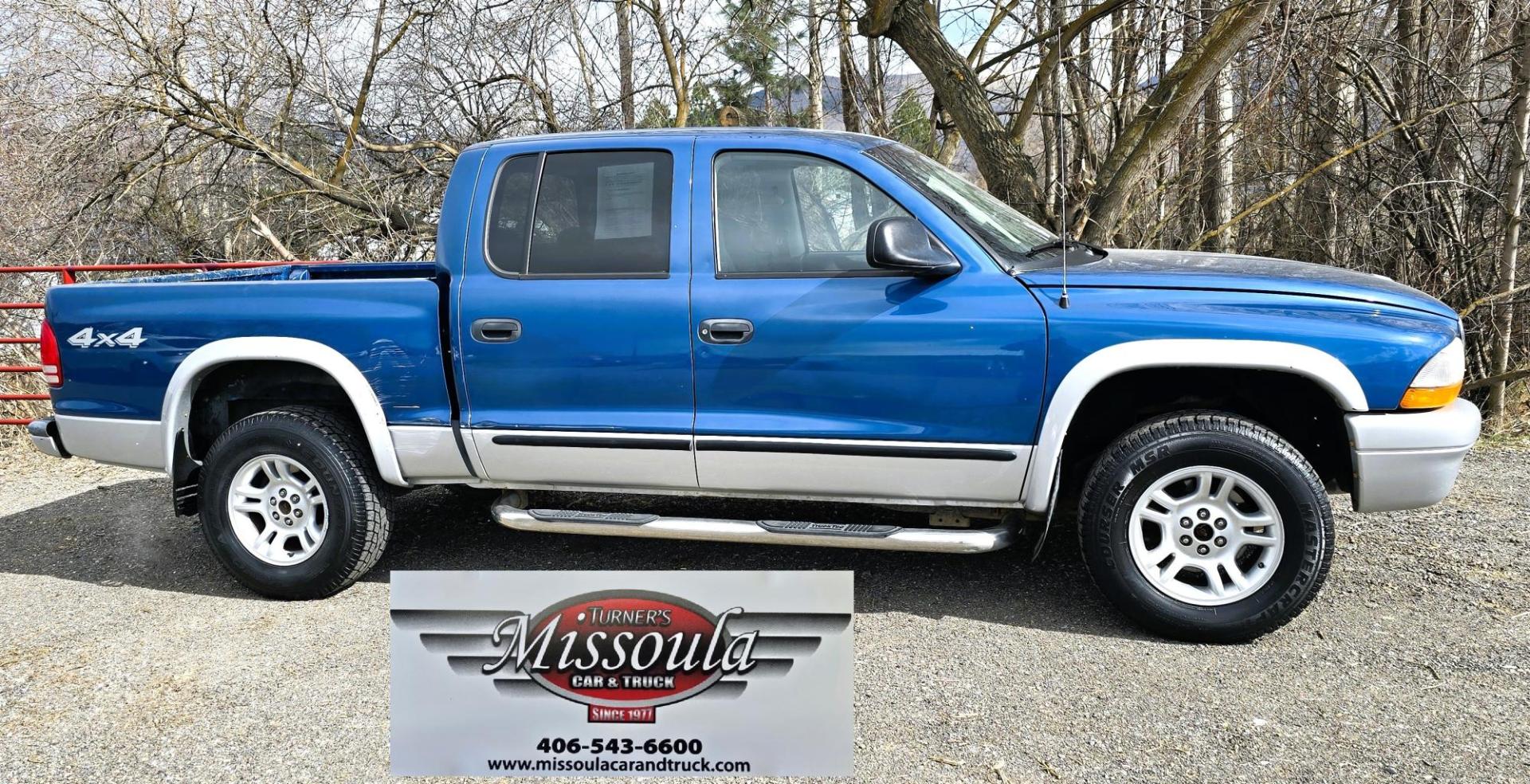 2003 Blue /Gray Dodge Dakota SLT (1D7HG48N63S) with an 4.7L V8 SOHC 16V engine, Automatic with Overdrive transmission, located at 450 N Russell, Missoula, MT, 59801, (406) 543-6600, 46.874496, -114.017433 - Nice mid-size 4WD. 4.7l V8 Offers Power and Economy. Automatic Transmission. Air. Cruise. Tilt. Power Windows and Locks.AM FM CD Player. Excellent Tires. Has a dent on the passenger side and the Center arm Rest is Missing. Because of the age of this vehicle, our lenders do NOT offer financing. - Photo#3