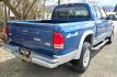 2003 Blue /Gray Dodge Dakota SLT (1D7HG48N63S) with an 4.7L V8 SOHC 16V engine, Automatic with Overdrive transmission, located at 450 N Russell, Missoula, MT, 59801, (406) 543-6600, 46.874496, -114.017433 - Nice mid-size 4WD. 4.7l V8 Offers Power and Economy. Automatic Transmission. Air. Cruise. Tilt. Power Windows and Locks.AM FM CD Player. Excellent Tires. Has a dent on the passenger side and the Center arm Rest is Missing. Because of the age of this vehicle, our lenders do NOT offer financing. - Photo#8