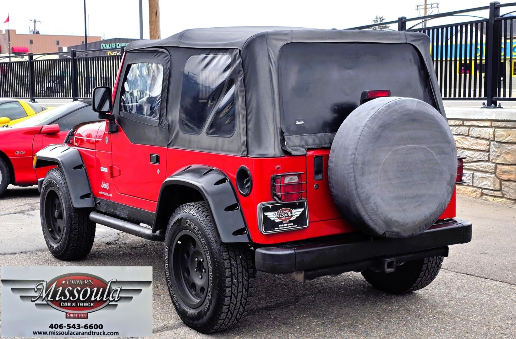2004 Red Jeep Wrangler Columbia Edition (1J4FA39S54P) with an 4.0L L6 OHV 12V engine, Automatic transmission, located at 450 N Russell, Missoula, MT, 59801, (406) 543-6600, 46.874496, -114.017433 - Excellent Condition Jeep Wrangler X in a Rare Columbia Edition. Comes with the near Bullet Proof 4.0L Straight 6 Engine. Automatic Transmission that was replaced about 10K miles ago. Air Conditioning. Cloth Top. Has a winch on the front but no remote cable to run it. Does not have a back seat. AM FM - Photo#3