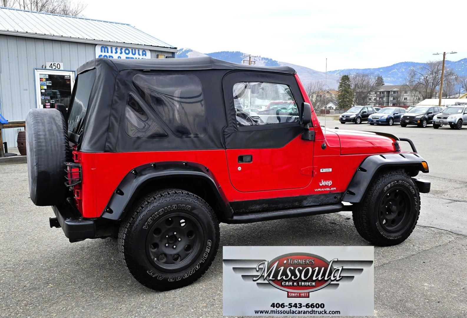 2004 Red Jeep Wrangler Columbia Edition (1J4FA39S54P) with an 4.0L L6 OHV 12V engine, Automatic transmission, located at 450 N Russell, Missoula, MT, 59801, (406) 543-6600, 46.874496, -114.017433 - Excellent Condition Jeep Wrangler X in a Rare Columbia Edition. Comes with the near Bullet Proof 4.0L Straight 6 Engine. Automatic Transmission that was replaced about 10K miles ago. Air Conditioning. Cloth Top. Has a winch on the front but no remote cable to run it. Does not have a back seat. AM FM - Photo#5