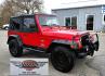 2004 Red Jeep Wrangler Columbia Edition (1J4FA39S54P) with an 4.0L L6 OHV 12V engine, Automatic transmission, located at 450 N Russell, Missoula, MT, 59801, (406) 543-6600, 46.874496, -114.017433 - Excellent Condition Jeep Wrangler X in a Rare Columbia Edition. Comes with the near Bullet Proof 4.0L Straight 6 Engine. Automatic Transmission that was replaced about 10K miles ago. Air Conditioning. Cloth Top. Has a winch on the front but no remote cable to run it. Does not have a back seat. AM FM - Photo#6