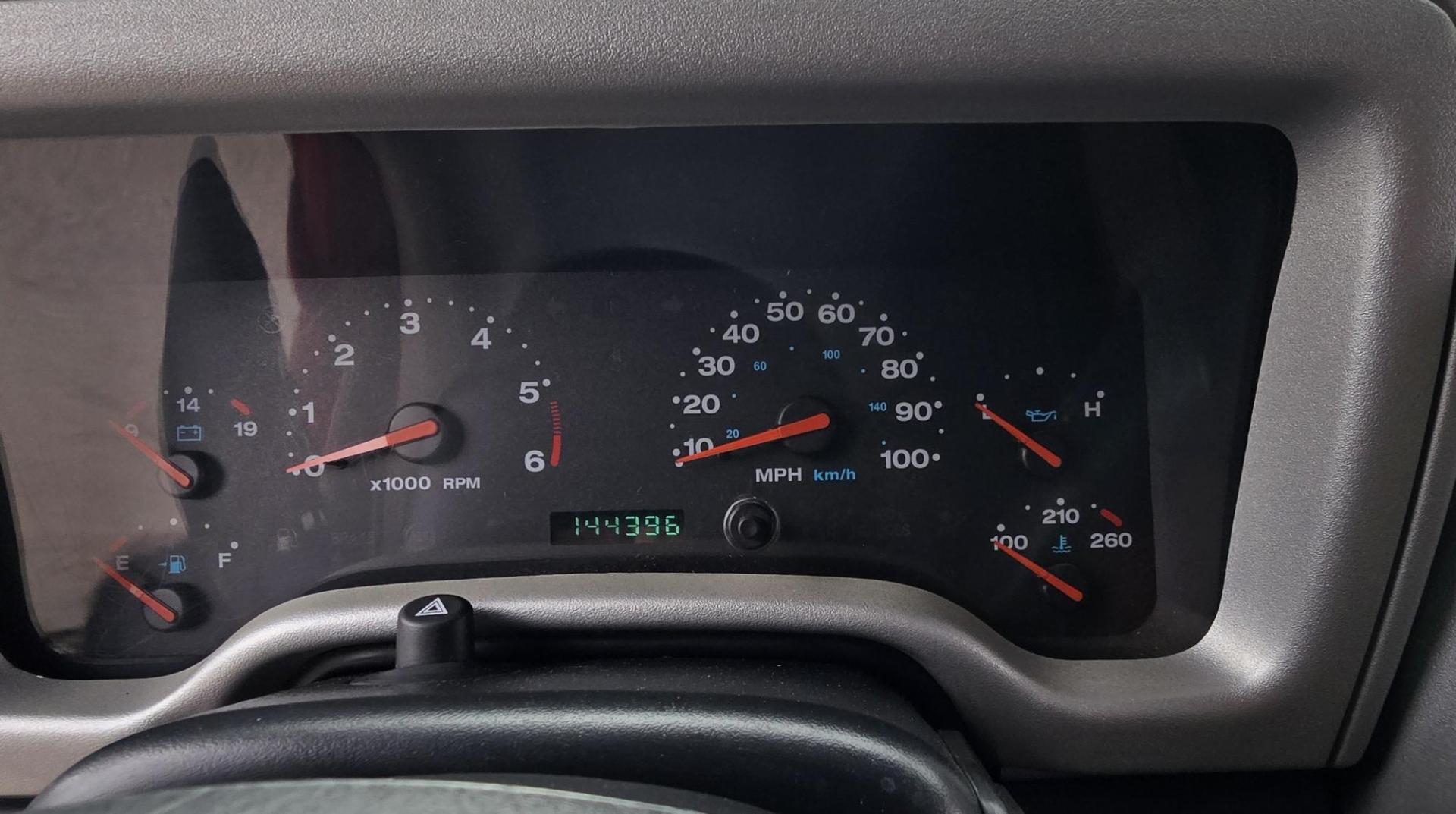 2004 Red Jeep Wrangler Columbia Edition (1J4FA39S54P) with an 4.0L L6 OHV 12V engine, Automatic transmission, located at 450 N Russell, Missoula, MT, 59801, (406) 543-6600, 46.874496, -114.017433 - Excellent Condition Jeep Wrangler X in a Rare Columbia Edition. Comes with the near Bullet Proof 4.0L Straight 6 Engine. Automatic Transmission that was replaced about 10K miles ago. Air Conditioning. Cloth Top. Has a winch on the front but no remote cable to run it. Does not have a back seat. AM FM - Photo#13