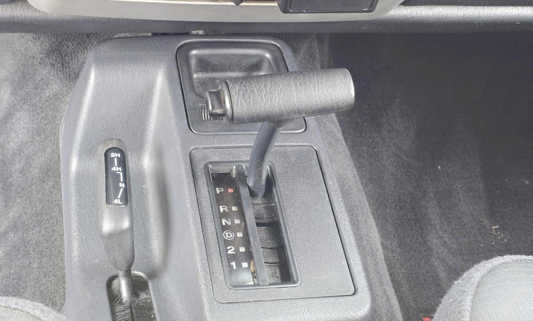 2004 Red Jeep Wrangler Columbia Edition (1J4FA39S54P) with an 4.0L L6 OHV 12V engine, Automatic transmission, located at 450 N Russell, Missoula, MT, 59801, (406) 543-6600, 46.874496, -114.017433 - Excellent Condition Jeep Wrangler X in a Rare Columbia Edition. Comes with the near Bullet Proof 4.0L Straight 6 Engine. Automatic Transmission that was replaced about 10K miles ago. Air Conditioning. Cloth Top. Has a winch on the front but no remote cable to run it. Does not have a back seat. AM FM - Photo#15