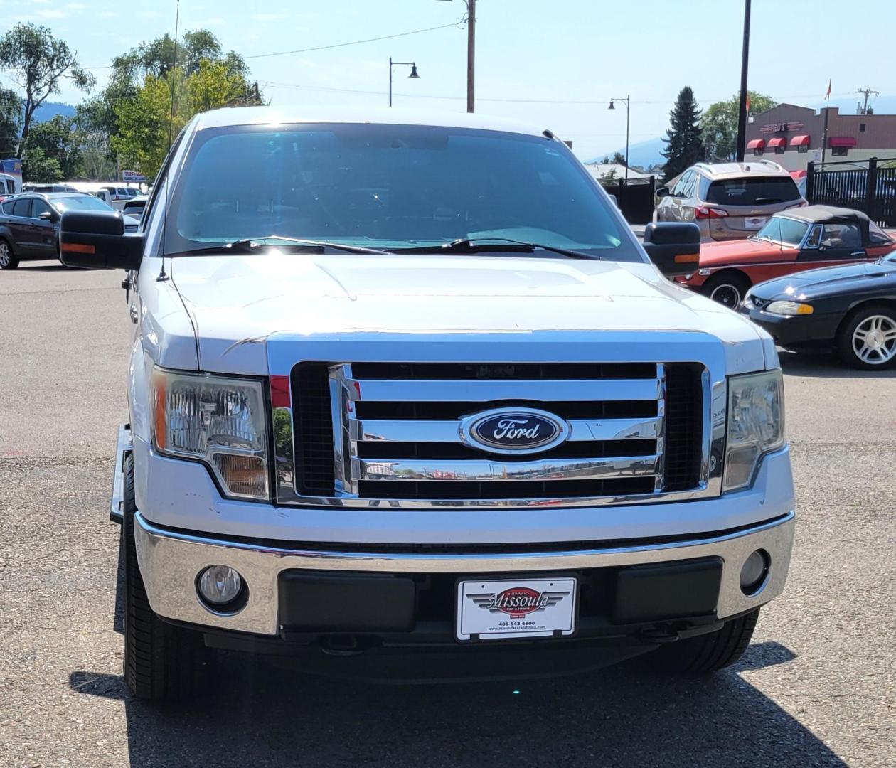 2011 White /Black Ford F-150 XLT (1FTFW1EF0BK) with an 5.0L V8 engine, 4-Speed Automatic transmission, located at 450 N Russell, Missoula, MT, 59801, (406) 543-6600, 46.874496, -114.017433 - Clean 4WD Truck. 5.0L V8 engine. 4 Speed Automatic Transmission. Air. Cruise. Tilt. Power Windows and Locks. Backup Camera. Running Boards. Towing. Tonneau Cover. Nice Highway Tires. Remote Start. - Photo#2