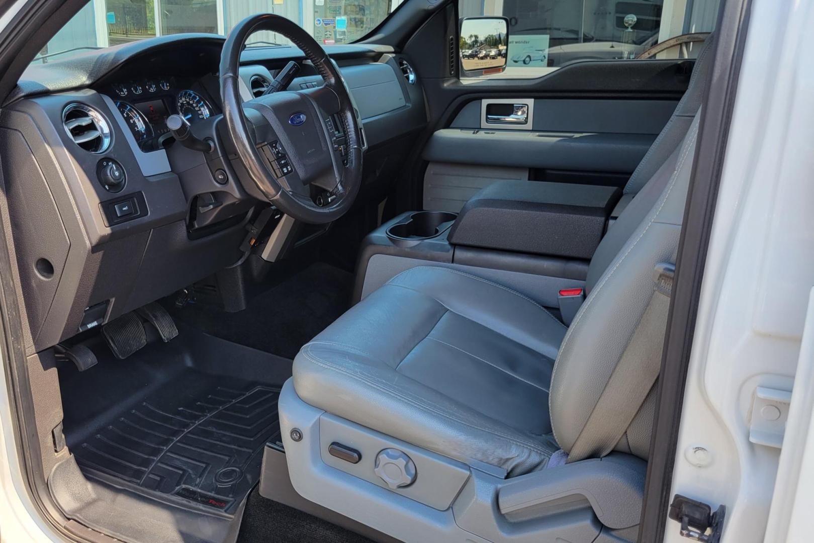 2011 White /Black Ford F-150 XLT (1FTFW1EF0BK) with an 5.0L V8 engine, 4-Speed Automatic transmission, located at 450 N Russell, Missoula, MT, 59801, (406) 543-6600, 46.874496, -114.017433 - Clean 4WD Truck. 5.0L V8 engine. 4 Speed Automatic Transmission. Air. Cruise. Tilt. Power Windows and Locks. Backup Camera. Running Boards. Towing. Tonneau Cover. Nice Highway Tires. Remote Start. - Photo#12