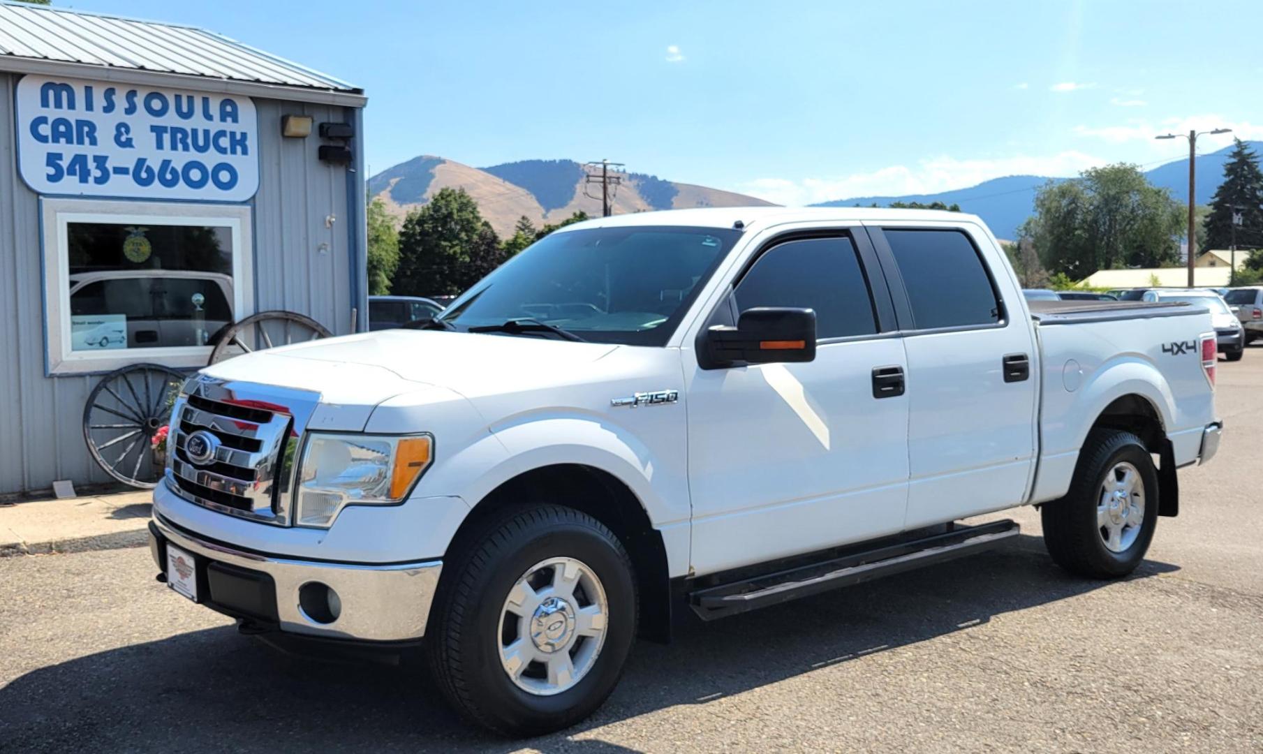 2011 White /Black Ford F-150 XLT (1FTFW1EF0BK) with an 5.0L V8 engine, 4-Speed Automatic transmission, located at 450 N Russell, Missoula, MT, 59801, (406) 543-6600, 46.874496, -114.017433 - Clean 4WD Truck. 5.0L V8 engine. 4 Speed Automatic Transmission. Air. Cruise. Tilt. Power Windows and Locks. Backup Camera. Running Boards. Towing. Tonneau Cover. Nice Highway Tires. Remote Start. - Photo#0