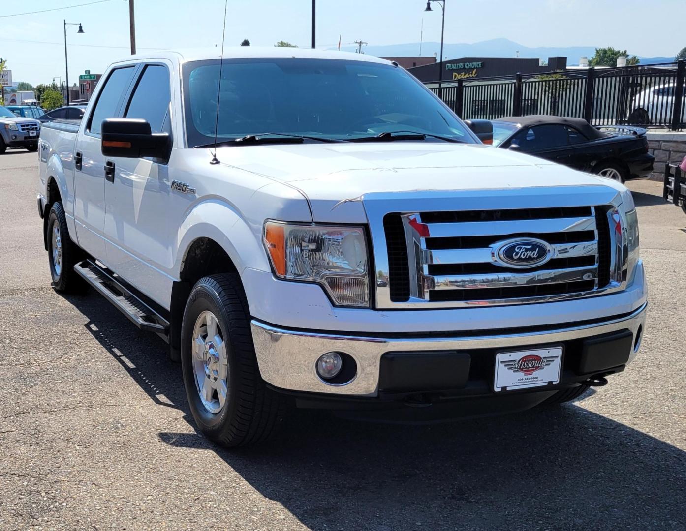 2011 White /Black Ford F-150 XLT (1FTFW1EF0BK) with an 5.0L V8 engine, 4-Speed Automatic transmission, located at 450 N Russell, Missoula, MT, 59801, (406) 543-6600, 46.874496, -114.017433 - Clean 4WD Truck. 5.0L V8 engine. 4 Speed Automatic Transmission. Air. Cruise. Tilt. Power Windows and Locks. Backup Camera. Running Boards. Towing. Tonneau Cover. Nice Highway Tires. Remote Start. - Photo#3