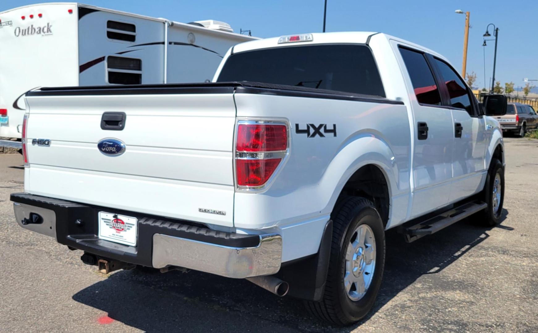 2011 White /Black Ford F-150 XLT (1FTFW1EF0BK) with an 5.0L V8 engine, 4-Speed Automatic transmission, located at 450 N Russell, Missoula, MT, 59801, (406) 543-6600, 46.874496, -114.017433 - Clean 4WD Truck. 5.0L V8 engine. 4 Speed Automatic Transmission. Air. Cruise. Tilt. Power Windows and Locks. Backup Camera. Running Boards. Towing. Tonneau Cover. Nice Highway Tires. Remote Start. - Photo#5