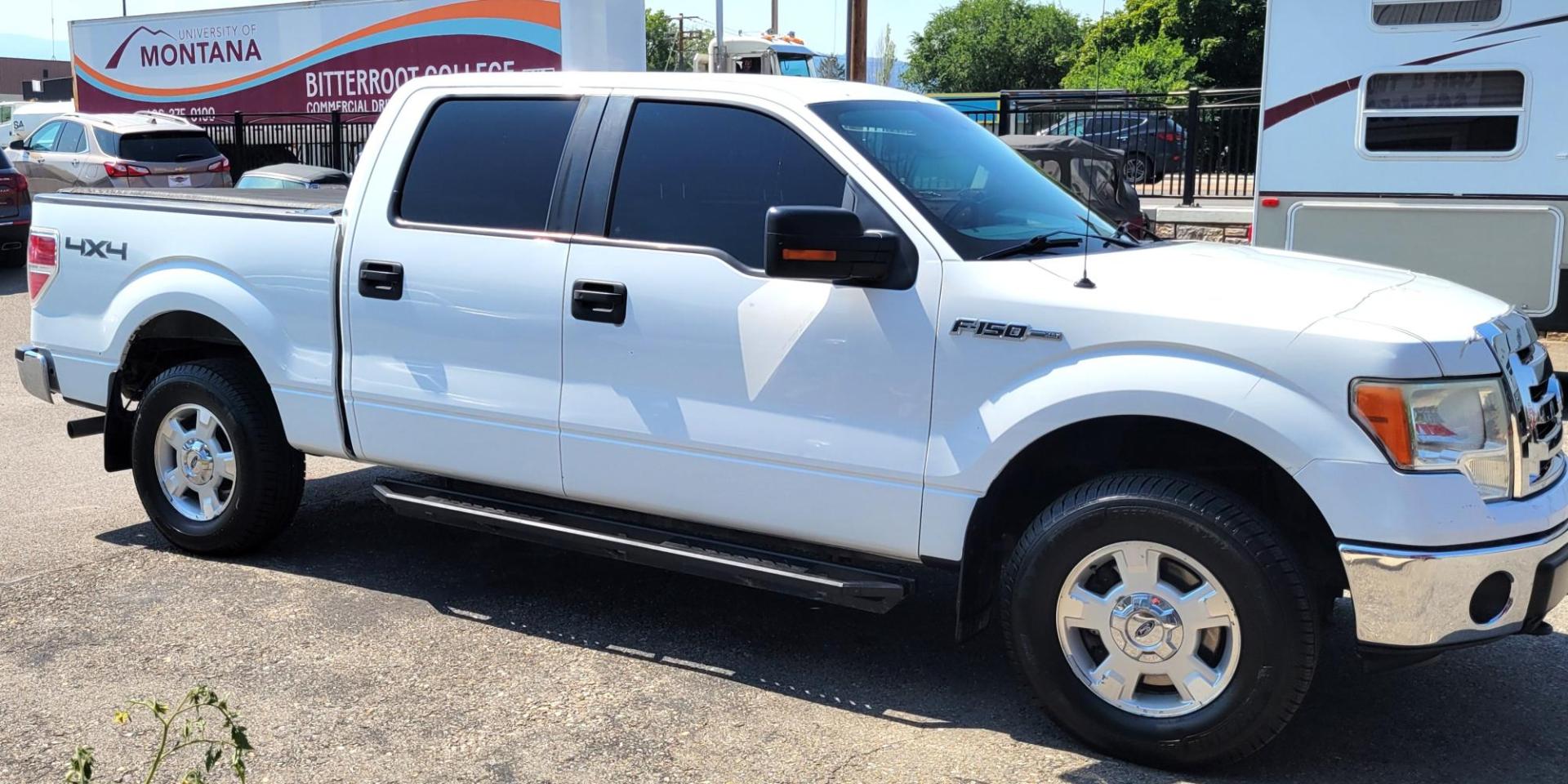 2011 White /Black Ford F-150 XLT (1FTFW1EF0BK) with an 5.0L V8 engine, 4-Speed Automatic transmission, located at 450 N Russell, Missoula, MT, 59801, (406) 543-6600, 46.874496, -114.017433 - Clean 4WD Truck. 5.0L V8 engine. 4 Speed Automatic Transmission. Air. Cruise. Tilt. Power Windows and Locks. Backup Camera. Running Boards. Towing. Tonneau Cover. Nice Highway Tires. Remote Start. - Photo#6