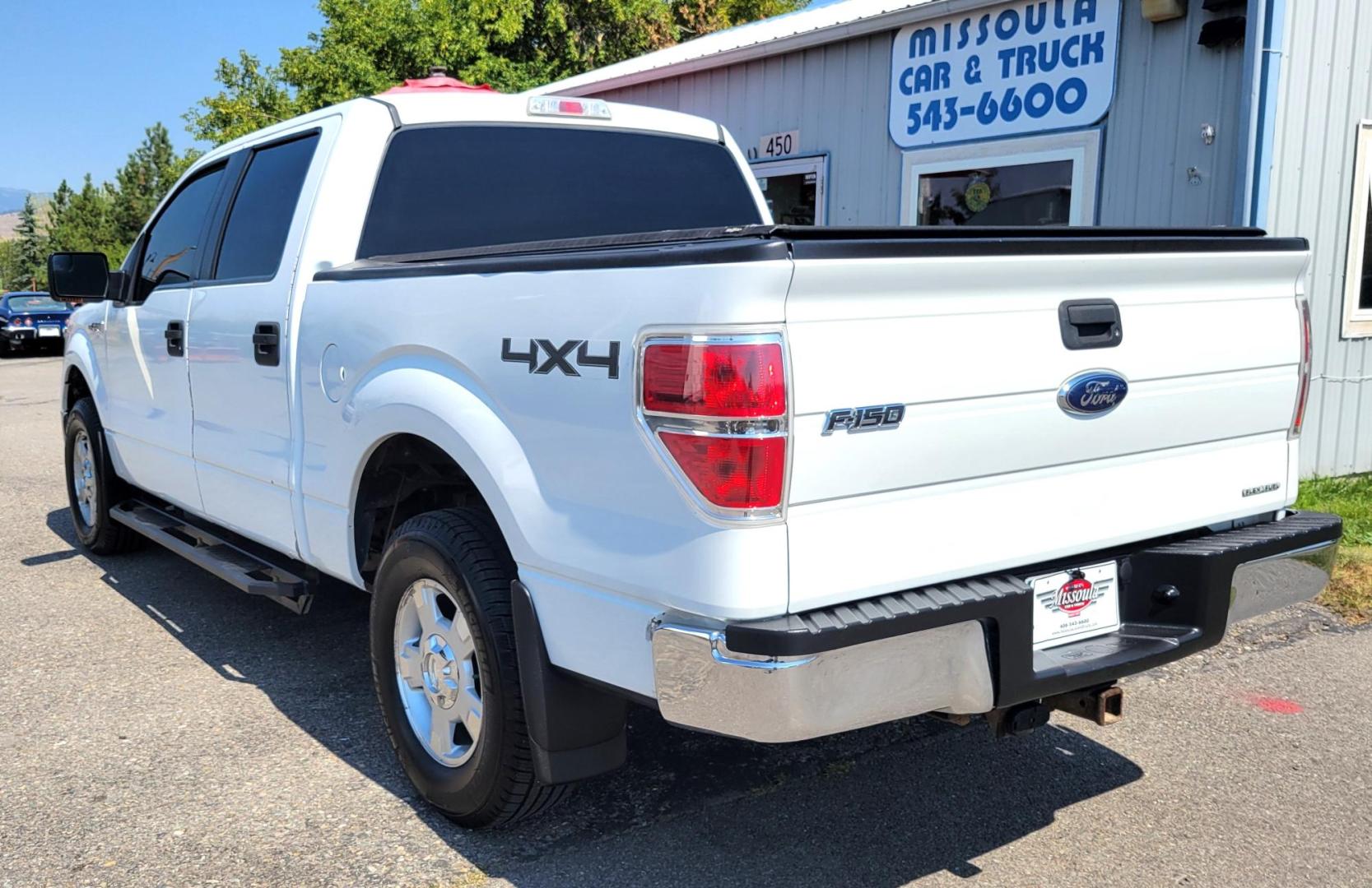 2011 White /Black Ford F-150 XLT (1FTFW1EF0BK) with an 5.0L V8 engine, 4-Speed Automatic transmission, located at 450 N Russell, Missoula, MT, 59801, (406) 543-6600, 46.874496, -114.017433 - Clean 4WD Truck. 5.0L V8 engine. 4 Speed Automatic Transmission. Air. Cruise. Tilt. Power Windows and Locks. Backup Camera. Running Boards. Towing. Tonneau Cover. Nice Highway Tires. Remote Start. - Photo#8
