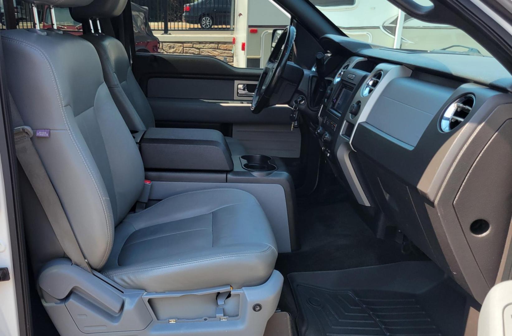 2011 White /Black Ford F-150 XLT (1FTFW1EF0BK) with an 5.0L V8 engine, 4-Speed Automatic transmission, located at 450 N Russell, Missoula, MT, 59801, (406) 543-6600, 46.874496, -114.017433 - Clean 4WD Truck. 5.0L V8 engine. 4 Speed Automatic Transmission. Air. Cruise. Tilt. Power Windows and Locks. Backup Camera. Running Boards. Towing. Tonneau Cover. Nice Highway Tires. Remote Start. - Photo#9