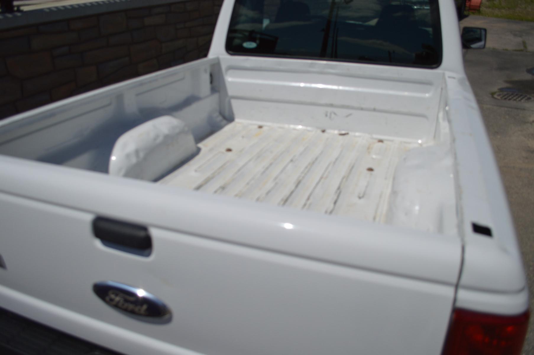 2009 White Ford Ranger Sport SuperCab 2WD (1FTYR14D19P) with an 2.3L L4 SOHC 8V engine, Automatic transmission, located at 450 N Russell, Missoula, MT, 59801, (406) 543-6600, 46.874496, -114.017433 - 1 Owner. Only 48K Miles. Excellent Condition. Clean CarFax - Photo #5