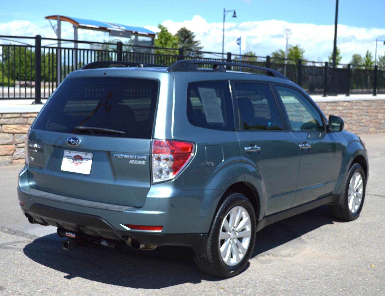 2013 Green Subaru Forester 2.5X Premium (JF2SHADC6DG) with an 2.5L H4 SOHC 16V engine, 5-Speed Manual transmission, located at 450 N Russell, Missoula, MT, 59801, (406) 543-6600, 46.874496, -114.017433 - 2013 Forester. Has Timing Chain not timing belt. 5 Speed Manual transmission. Power Sunroof. Air Conditioning. Heated Seats. Cruise. Tilt. Bluetooth. Backup Camera. - Photo #2