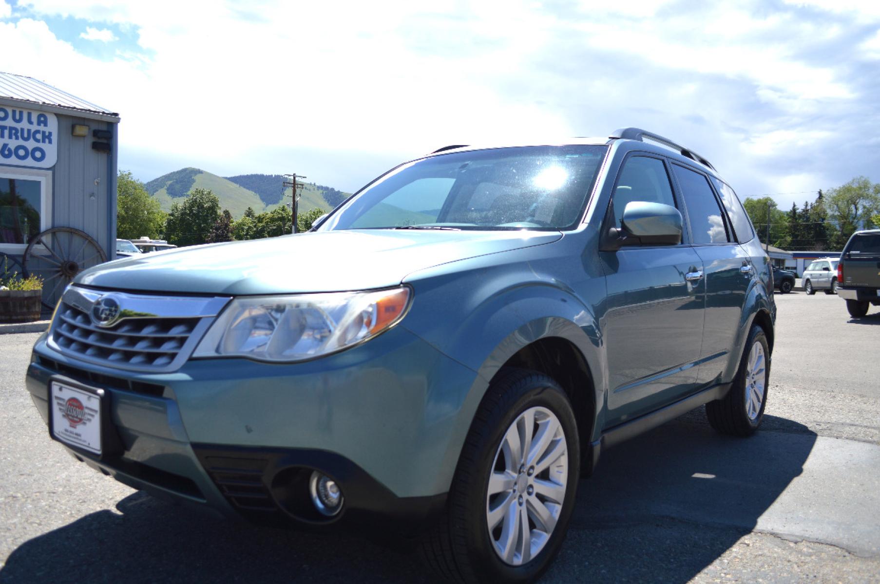 2013 Green Subaru Forester 2.5X Premium (JF2SHADC6DG) with an 2.5L H4 SOHC 16V engine, 5-Speed Manual transmission, located at 450 N Russell, Missoula, MT, 59801, (406) 543-6600, 46.874496, -114.017433 - 2013 Forester. Has Timing Chain not timing belt. 5 Speed Manual transmission. Power Sunroof. Air Conditioning. Heated Seats. Cruise. Tilt. Bluetooth. Backup Camera. - Photo #6