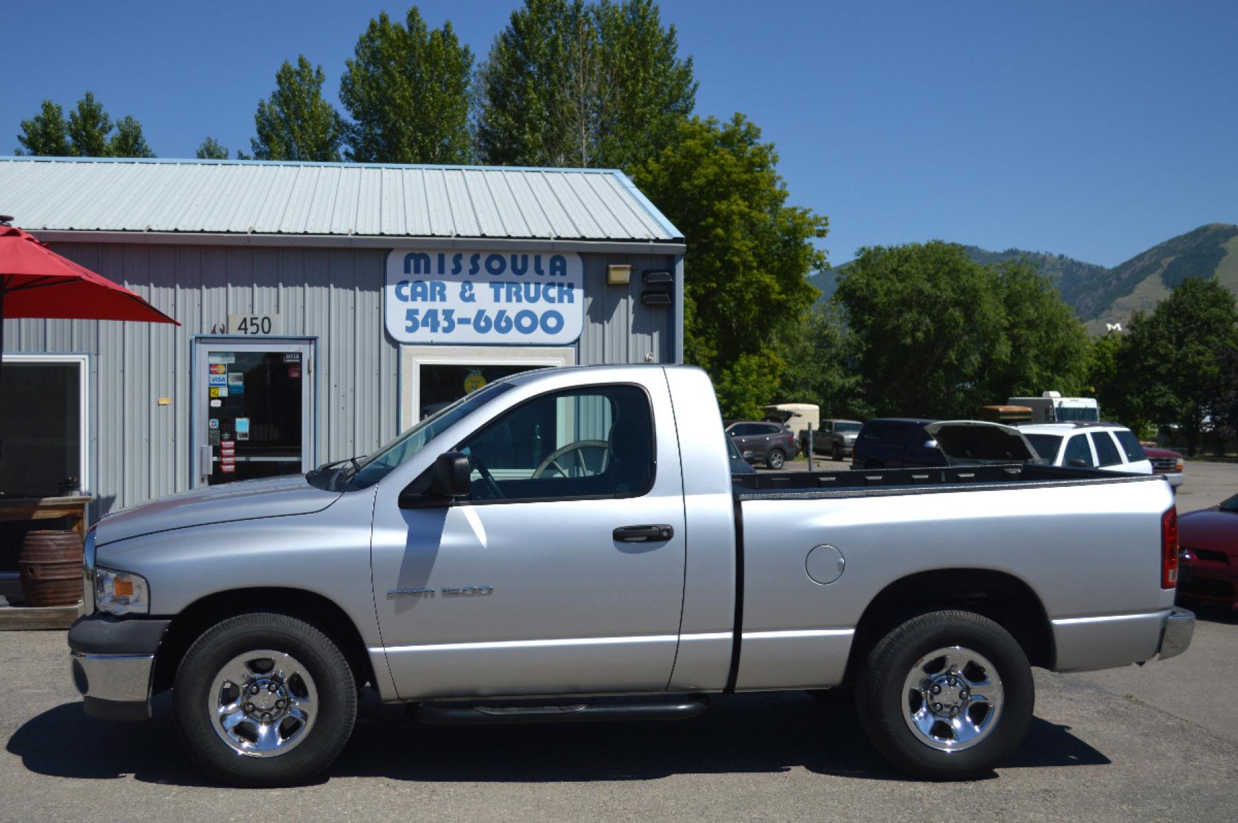 2002 Silver Dodge Ram 1500 SLT Long Bed 2WD (1D7HA16K82J) with an 3.7L V6 SOHC 12V engine, 4-Speed Automatic transmission, located at 450 N Russell, Missoula, MT, 59801, (406) 543-6600, 46.874496, -114.017433 - Cute Dodge Shorty. Only 93K Miles. 3.7 V-6 Engine. Automatic Transmission. Air Conditioning. Cruise. Straight and clean little Shorty - Photo #5