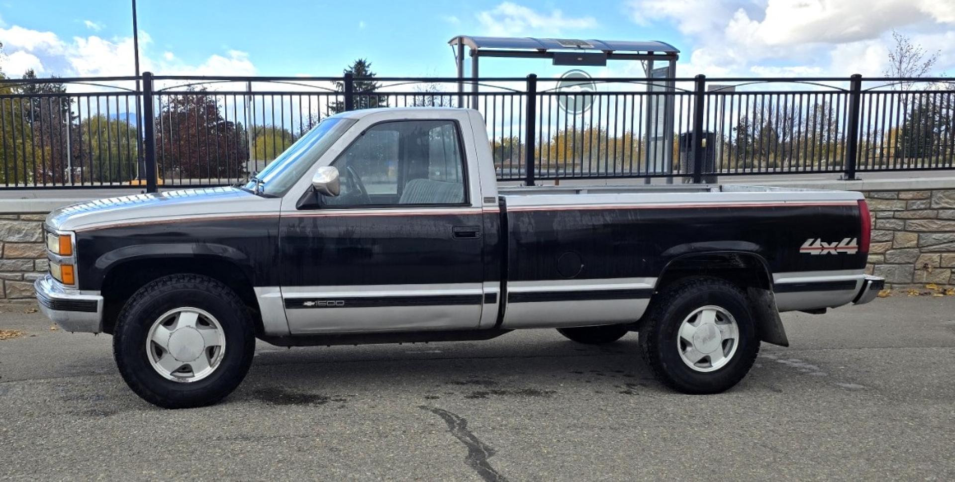 1990 Black Chevrolet C/K 1500 Reg. Cab 8 ft. Bed 4WD (2GCEK14K0L1) with an 5.7L V8 OHV 16V engine, 4-Speed Automatic Overdrive transmission, located at 450 N Russell, Missoula, MT, 59801, (406) 543-6600, 46.874496, -114.017433 - Low miles at 159k. 5.7L V8 Engine. Automatic Transmission. 4 Wheel Drive. Air. Cruise. Tilt. Tires are Excellent. Set up for Towing. Because of the age, our lender do NOT offer financing on this vehicle. - Photo#0
