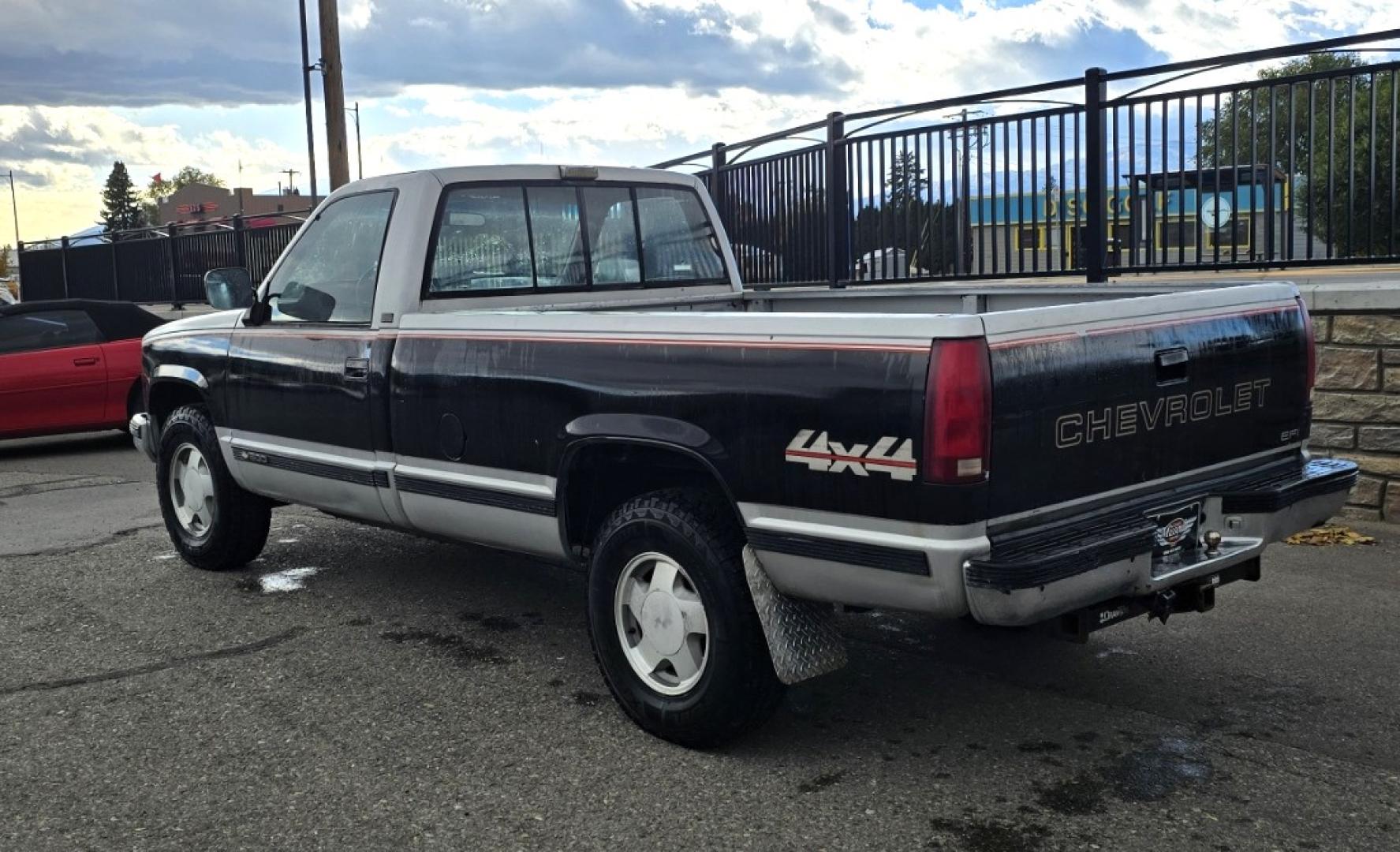 1990 Black Chevrolet C/K 1500 Reg. Cab 8 ft. Bed 4WD (2GCEK14K0L1) with an 5.7L V8 OHV 16V engine, 4-Speed Automatic Overdrive transmission, located at 450 N Russell, Missoula, MT, 59801, (406) 543-6600, 46.874496, -114.017433 - Low miles at 159k. 5.7L V8 Engine. Automatic Transmission. 4 Wheel Drive. Air. Cruise. Tilt. Tires are Excellent. Set up for Towing. Because of the age, our lender do NOT offer financing on this vehicle. - Photo#2
