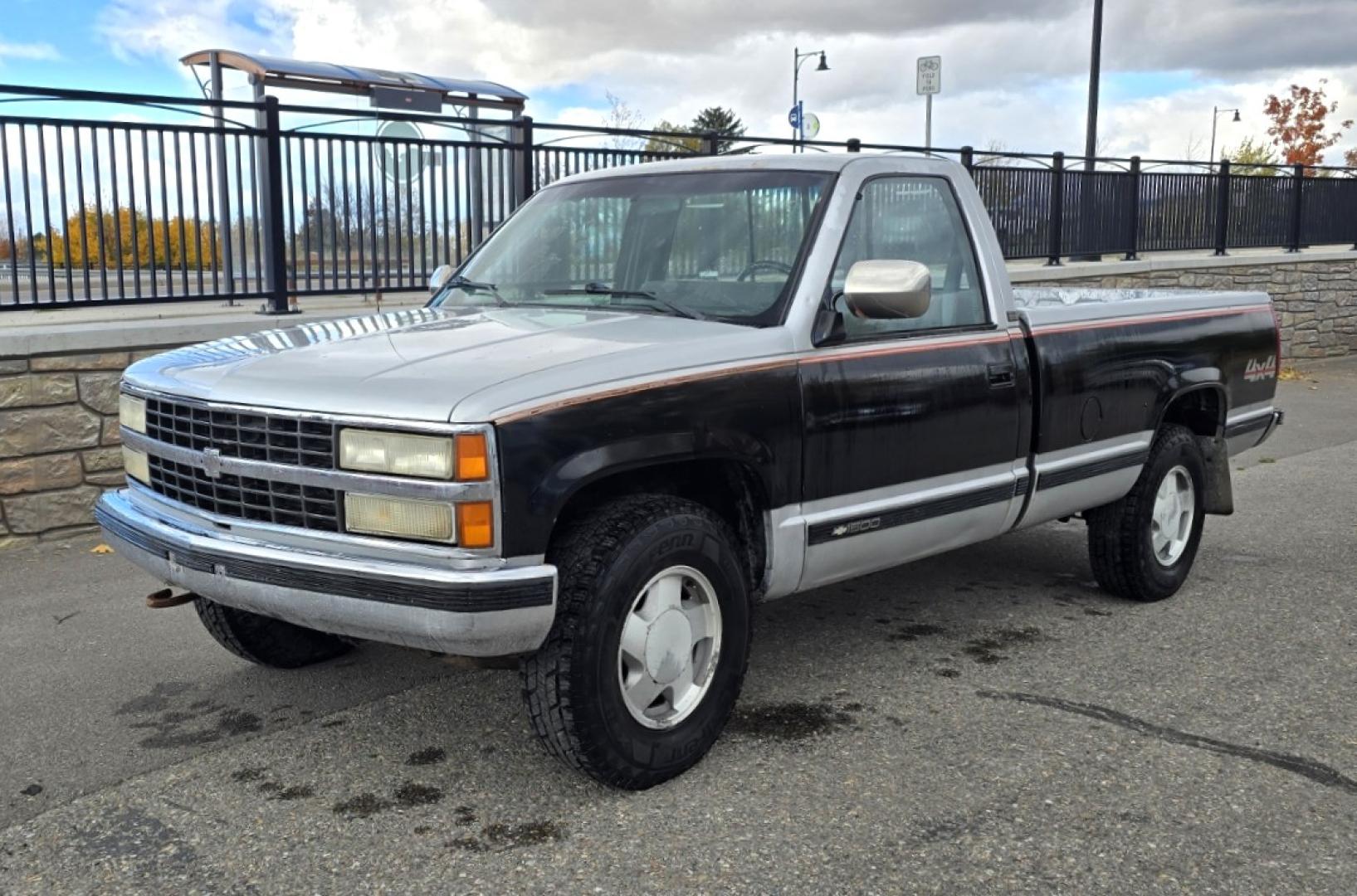 1990 Black Chevrolet C/K 1500 Reg. Cab 8 ft. Bed 4WD (2GCEK14K0L1) with an 5.7L V8 OHV 16V engine, 4-Speed Automatic Overdrive transmission, located at 450 N Russell, Missoula, MT, 59801, (406) 543-6600, 46.874496, -114.017433 - Low miles at 159k. 5.7L V8 Engine. Automatic Transmission. 4 Wheel Drive. Air. Cruise. Tilt. Tires are Excellent. Set up for Towing. Because of the age, our lender do NOT offer financing on this vehicle. - Photo#1