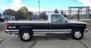1990 Black Chevrolet C/K 1500 Reg. Cab 8 ft. Bed 4WD (2GCEK14K0L1) with an 5.7L V8 OHV 16V engine, 4-Speed Automatic Overdrive transmission, located at 450 N Russell, Missoula, MT, 59801, (406) 543-6600, 46.874496, -114.017433 - Low miles at 159k. 5.7L V8 Engine. Automatic Transmission. 4 Wheel Drive. Air. Cruise. Tilt. Tires are Excellent. Set up for Towing. Because of the age, our lender do NOT offer financing on this vehicle. - Photo#5