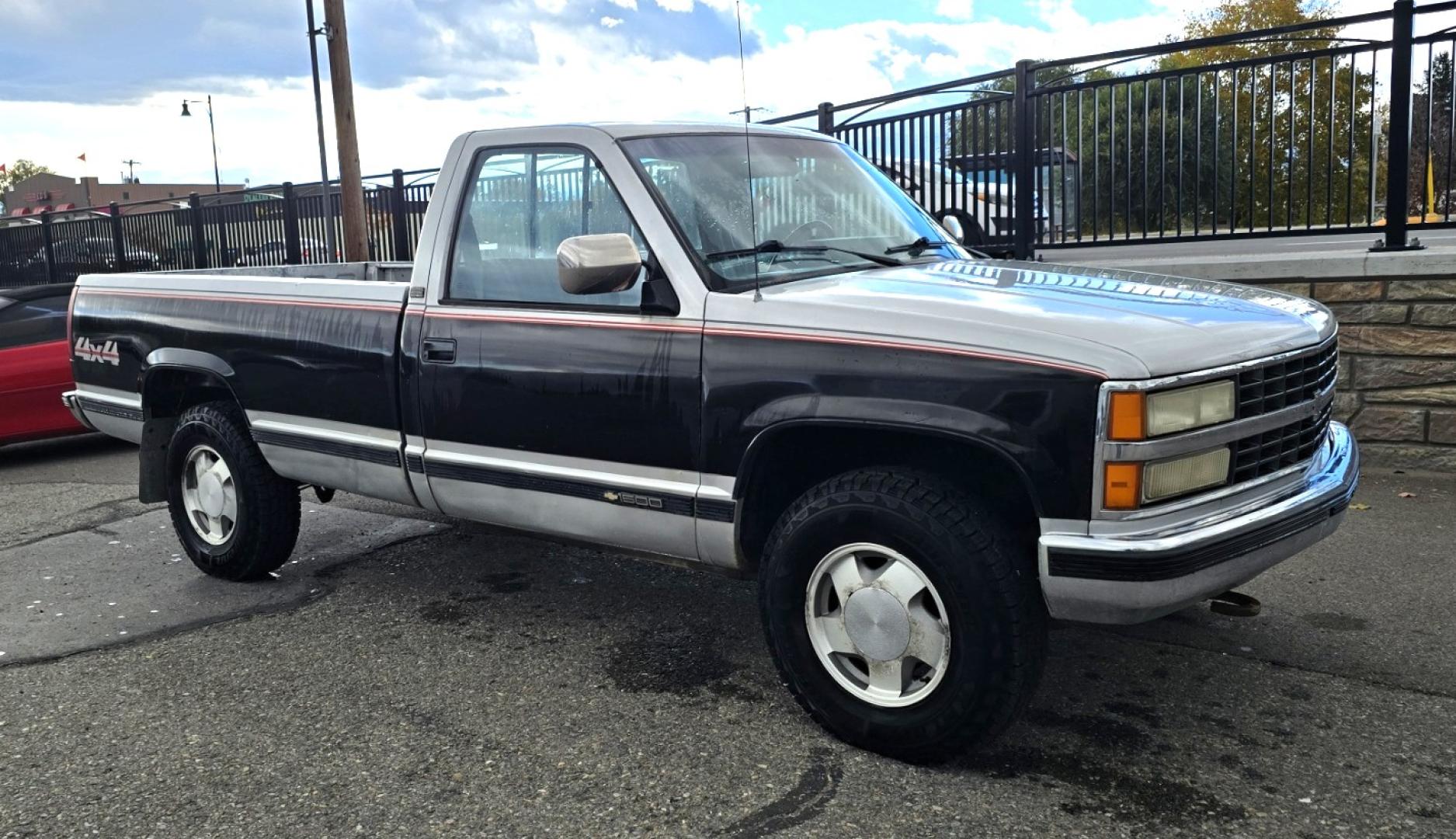 1990 Black Chevrolet C/K 1500 Reg. Cab 8 ft. Bed 4WD (2GCEK14K0L1) with an 5.7L V8 OHV 16V engine, 4-Speed Automatic Overdrive transmission, located at 450 N Russell, Missoula, MT, 59801, (406) 543-6600, 46.874496, -114.017433 - Low miles at 159k. 5.7L V8 Engine. Automatic Transmission. 4 Wheel Drive. Air. Cruise. Tilt. Tires are Excellent. Set up for Towing. Because of the age, our lender do NOT offer financing on this vehicle. - Photo#6