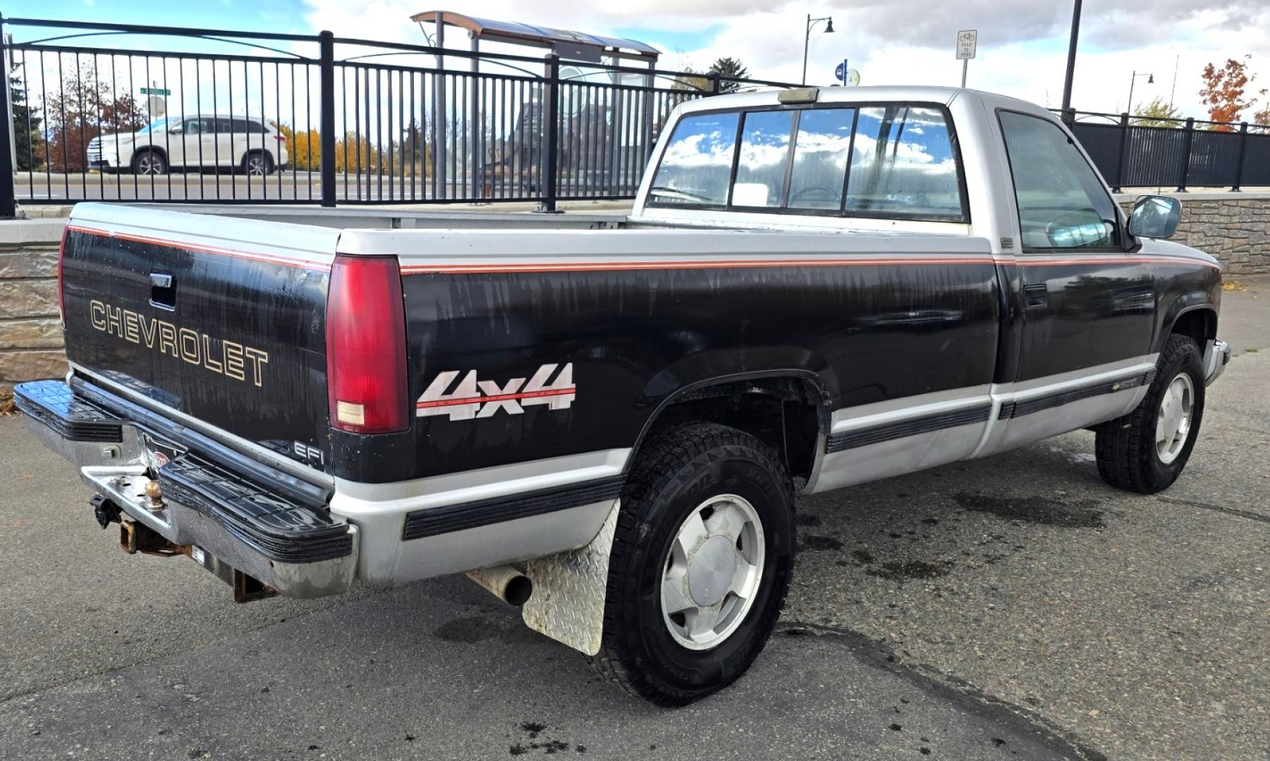 1990 Black Chevrolet C/K 1500 Reg. Cab 8 ft. Bed 4WD (2GCEK14K0L1) with an 5.7L V8 OHV 16V engine, 4-Speed Automatic Overdrive transmission, located at 450 N Russell, Missoula, MT, 59801, (406) 543-6600, 46.874496, -114.017433 - Low miles at 159k. 5.7L V8 Engine. Automatic Transmission. 4 Wheel Drive. Air. Cruise. Tilt. Tires are Excellent. Set up for Towing. Because of the age, our lender do NOT offer financing on this vehicle. - Photo#7