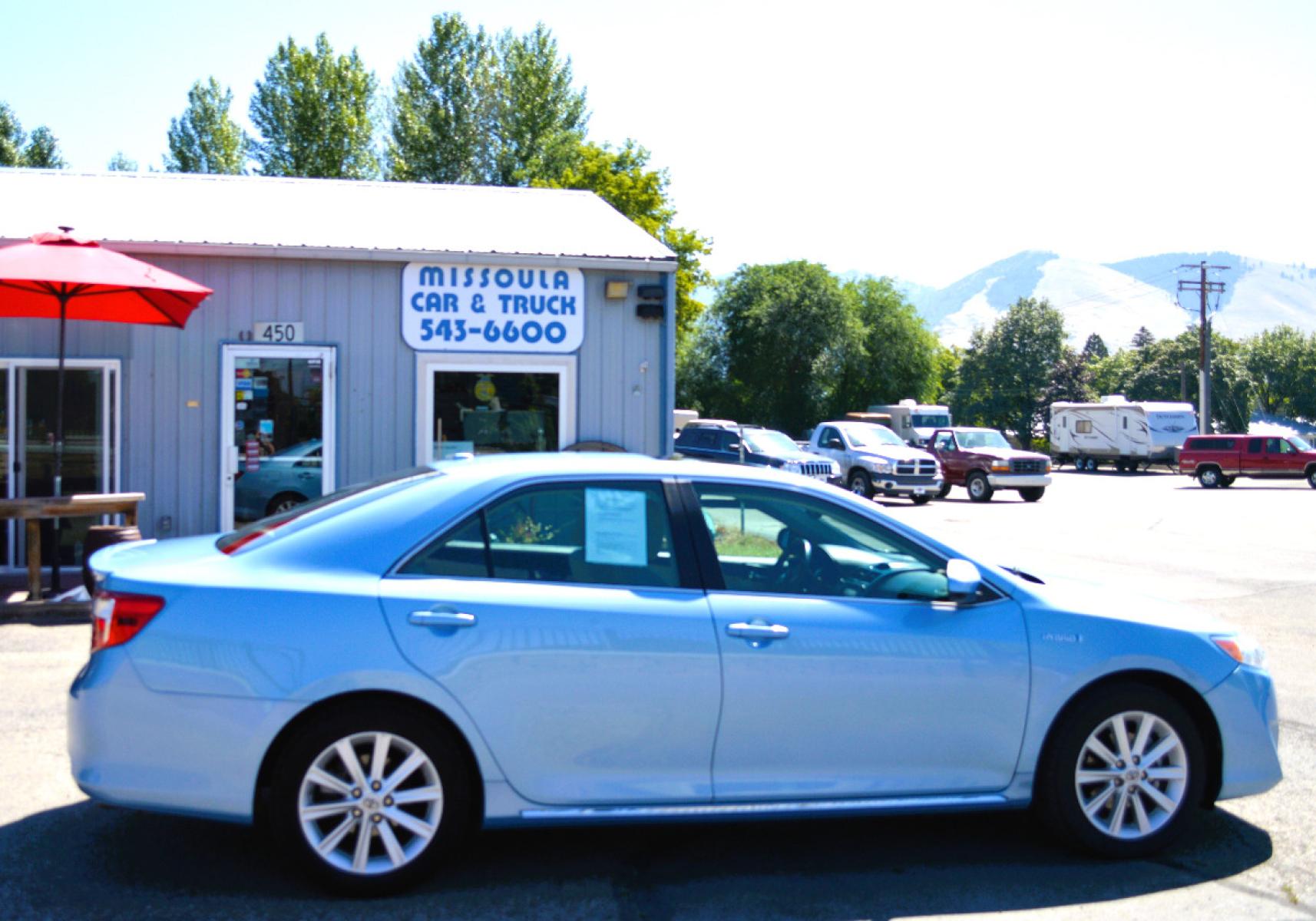 2013 Blue Toyota Camry Hybrid XLE (4T1BD1FKXDU) with an 2.5L L4 DOHC 16V HYBRID engine, Continuously Variable Transmission transmission, located at 450 N Russell, Missoula, MT, 59801, (406) 543-6600, 46.874496, -114.017433 - Beautiful Hybrid in very good condition. Only 47K Miles. Navigation. Backup Camera. Air Conditioning. Power Sunroof. Power Seats. Power Windows. Heated Seats. - Photo #0