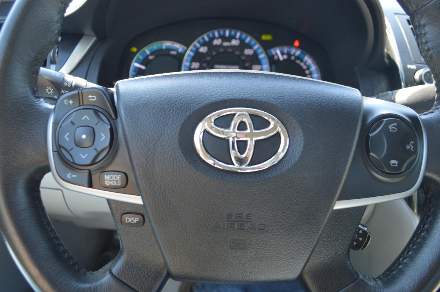 2013 Blue Toyota Camry Hybrid XLE (4T1BD1FKXDU) with an 2.5L L4 DOHC 16V HYBRID engine, Continuously Variable Transmission transmission, located at 450 N Russell, Missoula, MT, 59801, (406) 543-6600, 46.874496, -114.017433 - Beautiful Hybrid in very good condition. Only 47K Miles. Navigation. Backup Camera. Air Conditioning. Power Sunroof. Power Seats. Power Windows. Heated Seats. - Photo #13