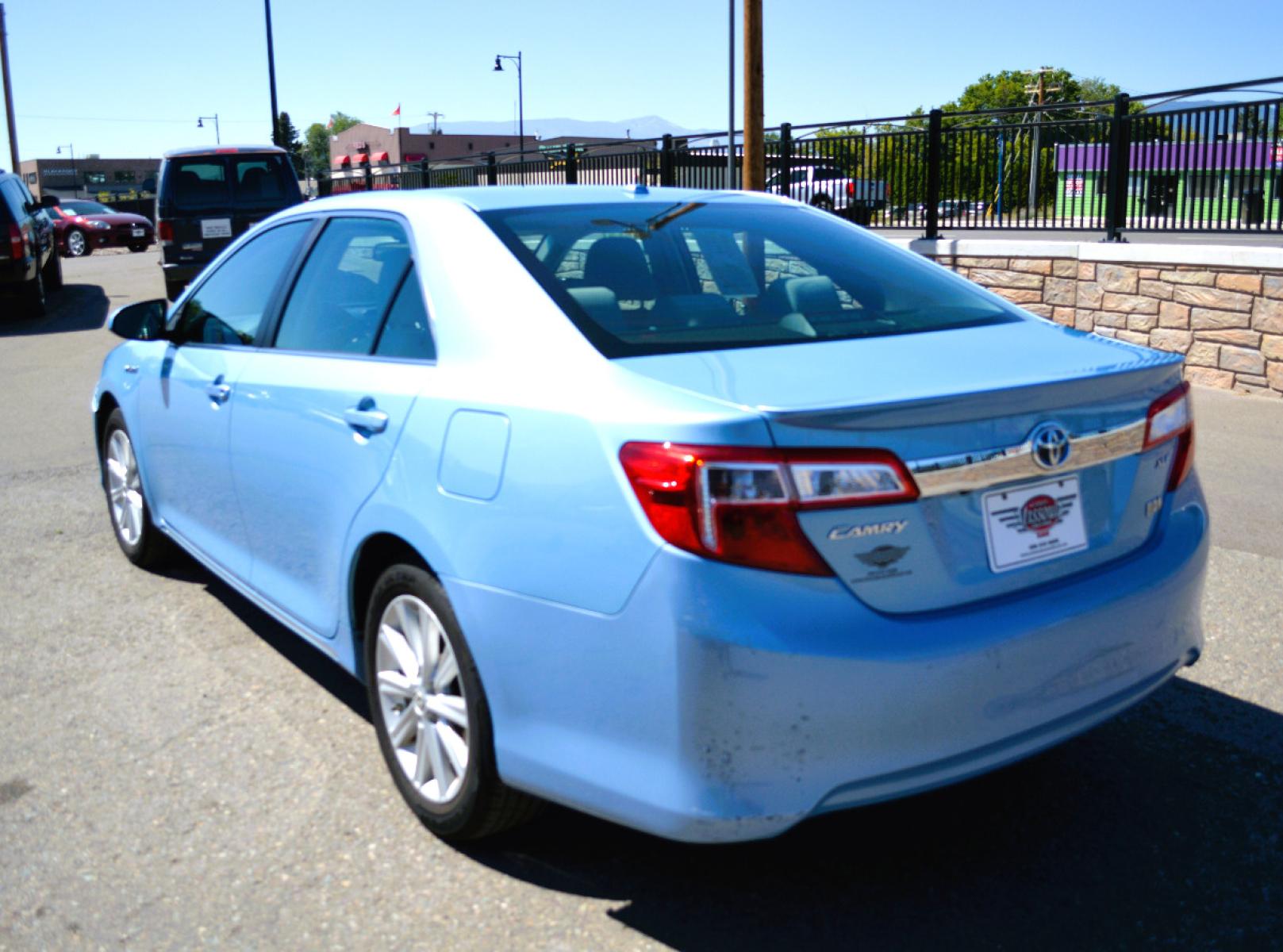 2013 Blue Toyota Camry Hybrid XLE (4T1BD1FKXDU) with an 2.5L L4 DOHC 16V HYBRID engine, Continuously Variable Transmission transmission, located at 450 N Russell, Missoula, MT, 59801, (406) 543-6600, 46.874496, -114.017433 - Beautiful Hybrid in very good condition. Only 47K Miles. Navigation. Backup Camera. Air Conditioning. Power Sunroof. Power Seats. Power Windows. Heated Seats. - Photo #3
