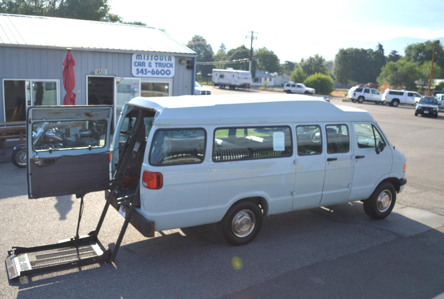 1997 Blue Dodge Ram Wagon B3500 (2B5WB35Z8VK) with an 5.9L V8 OHV 16V engine, 4-Speed Automatic Overdrive transmission, located at 450 N Russell, Missoula, MT, 59801, (406) 543-6600, 46.874496, -114.017433 - Only 86K Miles. Has a Hydraulic Wheel Chair Lift in the back. Seats 9 Total. Front and Rear Air Conditioning and Heat. Automatic Transmission. This vehicle is more then 20 years old and is not eligible for lending through our finance companies. - Photo #0