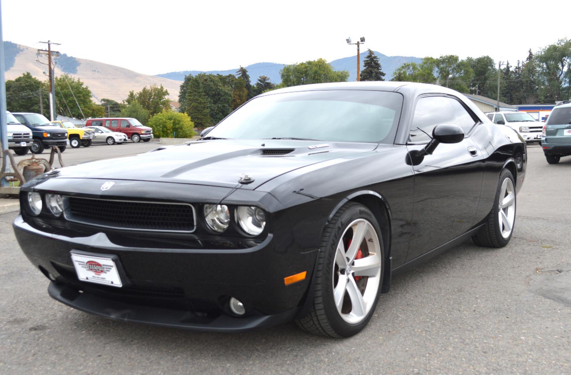 2010 Black /Black Dodge Challenger SRT8 (2B3CJ7DW6AH) with an 6.1L V8 OHV 16V engine, 5-Speed Automatic transmission, located at 450 N Russell, Missoula, MT, 59801, (406) 543-6600, 46.874496, -114.017433 - Sexy Beast of a Car. 6.1 Hemi V8. Automatic Transmission. Power Sunroof. Air Conditioning. Bluetooth. Navigation. Leather Heated Seats. Power Windows. Cruise. Tilt. - Photo #4