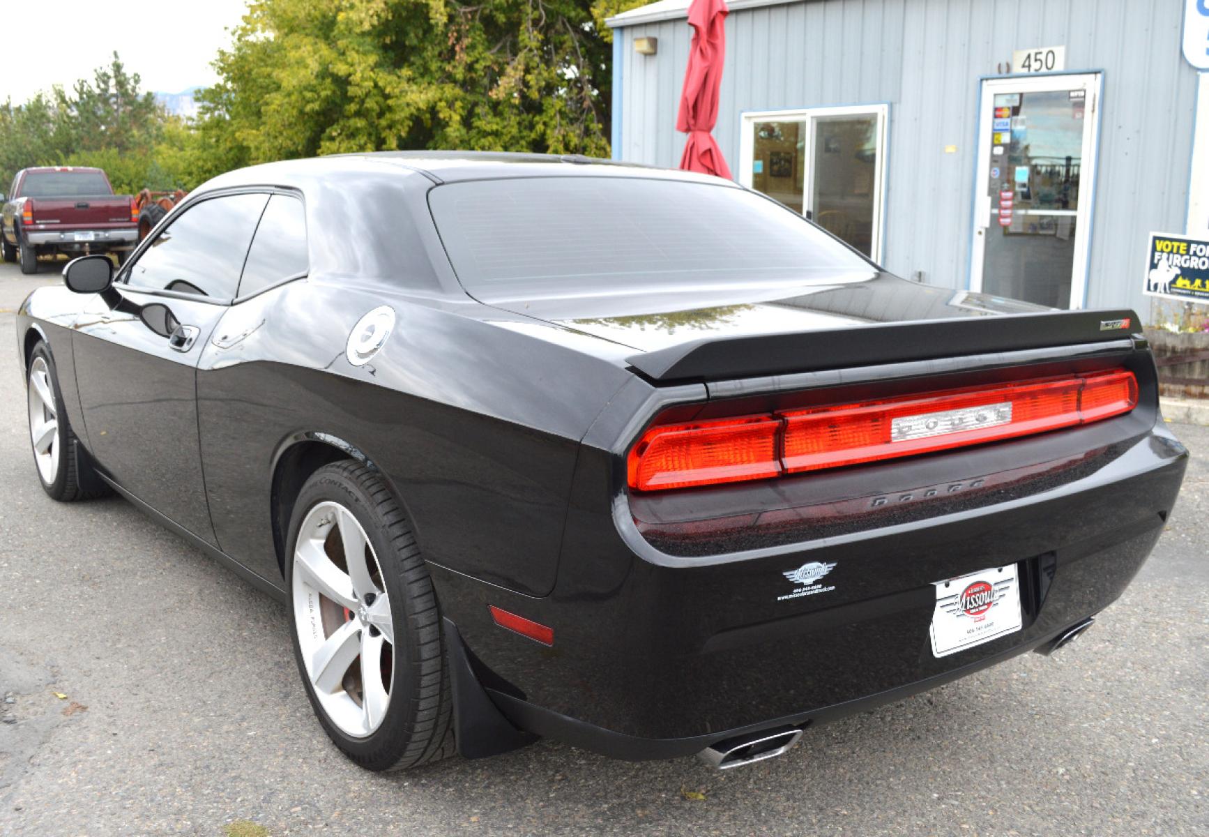 2010 Black /Black Dodge Challenger SRT8 (2B3CJ7DW6AH) with an 6.1L V8 OHV 16V engine, 5-Speed Automatic transmission, located at 450 N Russell, Missoula, MT, 59801, (406) 543-6600, 46.874496, -114.017433 - Sexy Beast of a Car. 6.1 Hemi V8. Automatic Transmission. Power Sunroof. Air Conditioning. Bluetooth. Navigation. Leather Heated Seats. Power Windows. Cruise. Tilt. - Photo #5