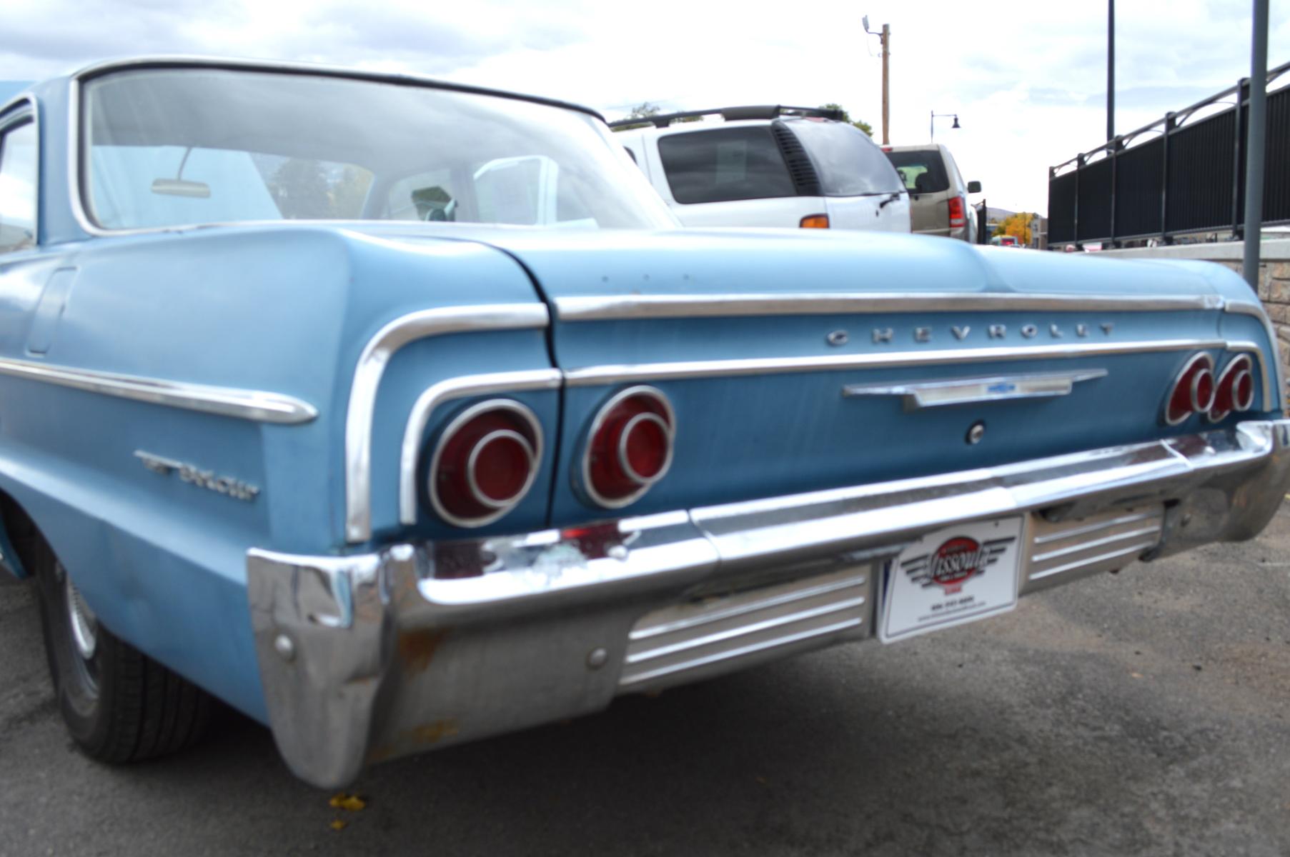 1964 Blue /Blue Chevrolet Bel Air (41669J32209) with an 301 V8 engine, Automatic transmission, located at 450 N Russell, Missoula, MT, 59801, (406) 543-6600, 46.874496, -114.017433 - Very Clean and Very Straight Classic Car. Newer Motor with only 5K Miles (No Documentation). Interior is good. No Rust. Original Ramhorn Exhaust Manifolds. Must See to Appreciate. This vehicle is more then 20 years old and is not eligible for lending through our finance companies. - Photo #14