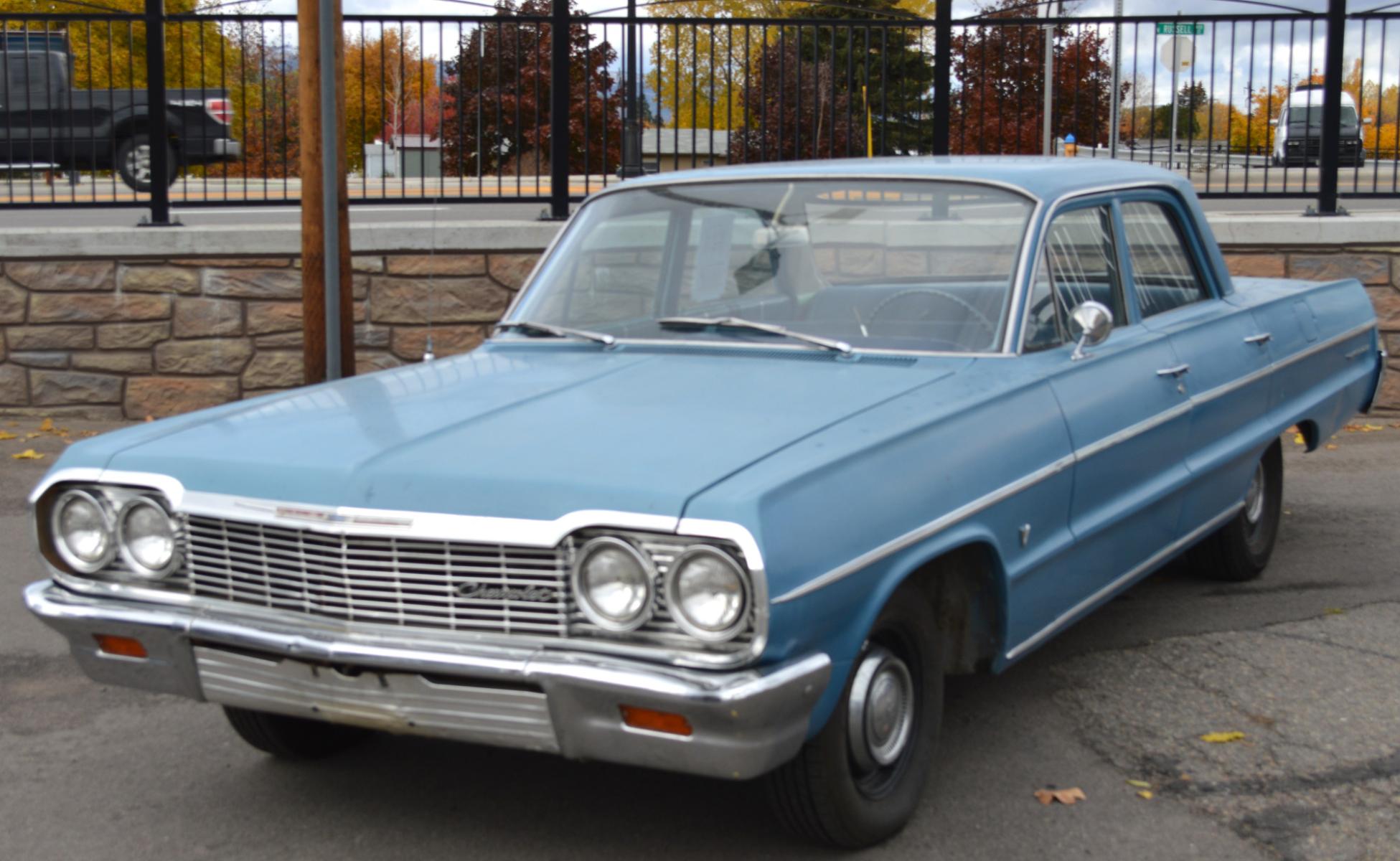1964 Blue /Blue Chevrolet Bel Air (41669J32209) with an 301 V8 engine, Automatic transmission, located at 450 N Russell, Missoula, MT, 59801, (406) 543-6600, 46.874496, -114.017433 - Very Clean and Very Straight Classic Car. Newer Motor with only 5K Miles (No Documentation). Interior is good. No Rust. Original Ramhorn Exhaust Manifolds. Must See to Appreciate. This vehicle is more then 20 years old and is not eligible for lending through our finance companies. - Photo #1