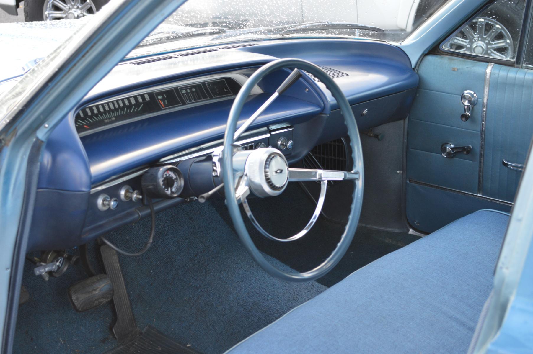 1964 Blue /Blue Chevrolet Bel Air (41669J32209) with an 301 V8 engine, Automatic transmission, located at 450 N Russell, Missoula, MT, 59801, (406) 543-6600, 46.874496, -114.017433 - Very Clean and Very Straight Classic Car. Newer Motor with only 5K Miles (No Documentation). Interior is good. No Rust. Original Ramhorn Exhaust Manifolds. Must See to Appreciate. This vehicle is more then 20 years old and is not eligible for lending through our finance companies. - Photo #19