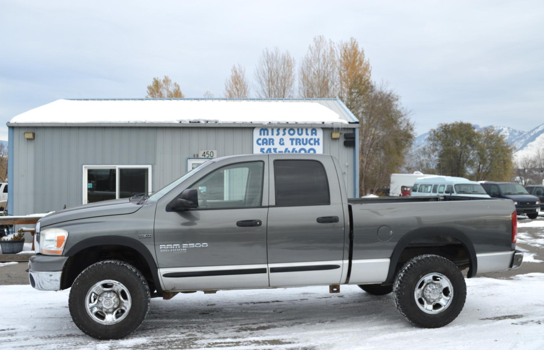 2006 Grey Dodge Ram 2500 Laramie Quad Cab 4WD (3D7KS28D56G) with an 5.7L V8 OHV 16V engine, Automatic transmission, located at 450 N Russell, Missoula, MT, 59801, (406) 543-6600, 46.874496, -114.017433 - Nice Truck. High miles but runs great. 4 Wheel Drive. Good Tires. Automatic Transmission. Air Conditioning. Power Windows and Locks. Cruise. Tilt. - Photo #0