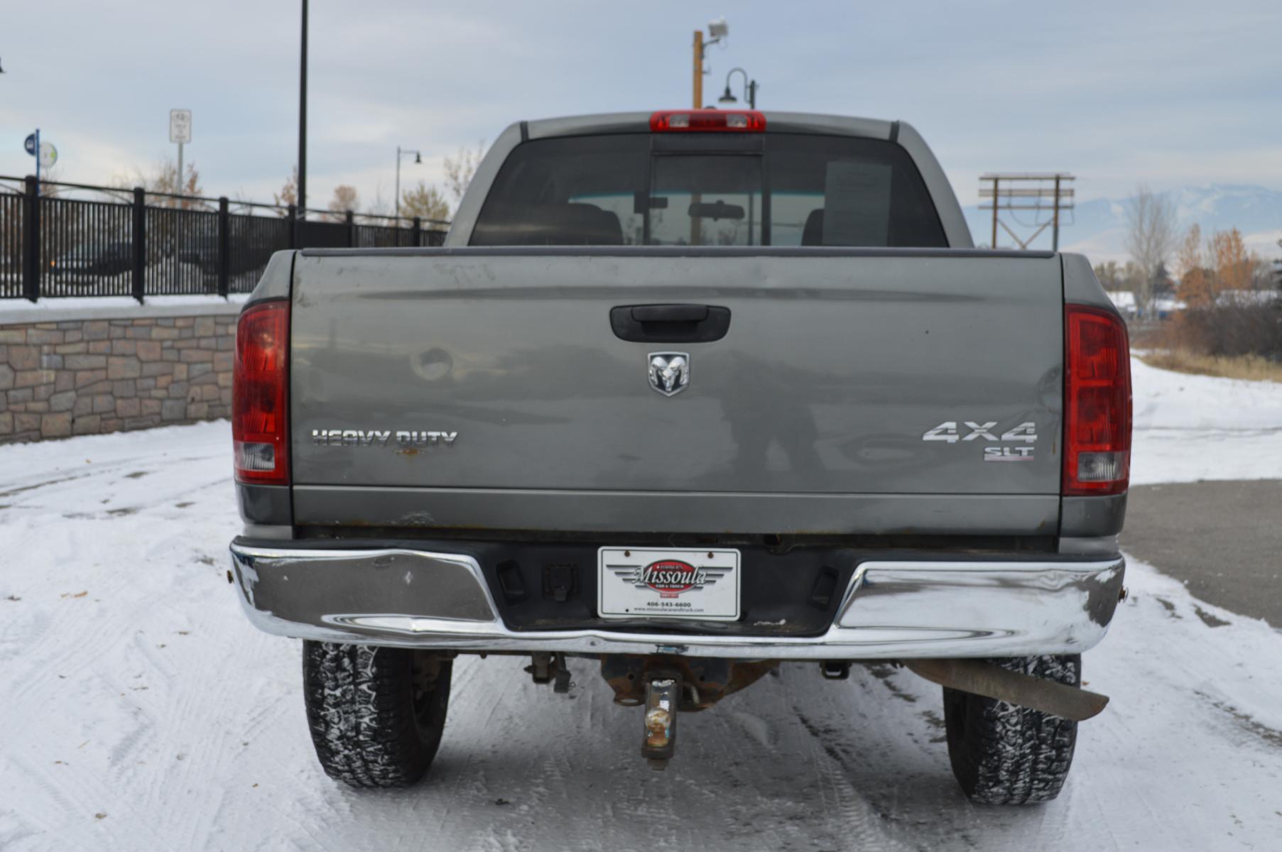 2006 Grey Dodge Ram 2500 Laramie Quad Cab 4WD (3D7KS28D56G) with an 5.7L V8 OHV 16V engine, Automatic transmission, located at 450 N Russell, Missoula, MT, 59801, (406) 543-6600, 46.874496, -114.017433 - Nice Truck. High miles but runs great. 4 Wheel Drive. Good Tires. Automatic Transmission. Air Conditioning. Power Windows and Locks. Cruise. Tilt. - Photo #4