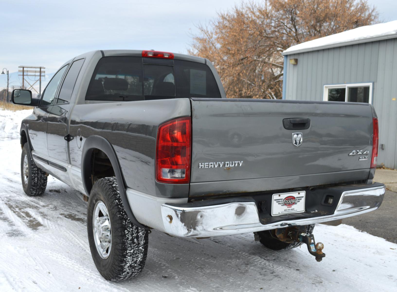 2006 Grey Dodge Ram 2500 Laramie Quad Cab 4WD (3D7KS28D56G) with an 5.7L V8 OHV 16V engine, Automatic transmission, located at 450 N Russell, Missoula, MT, 59801, (406) 543-6600, 46.874496, -114.017433 - Nice Truck. High miles but runs great. 4 Wheel Drive. Good Tires. Automatic Transmission. Air Conditioning. Power Windows and Locks. Cruise. Tilt. - Photo #5