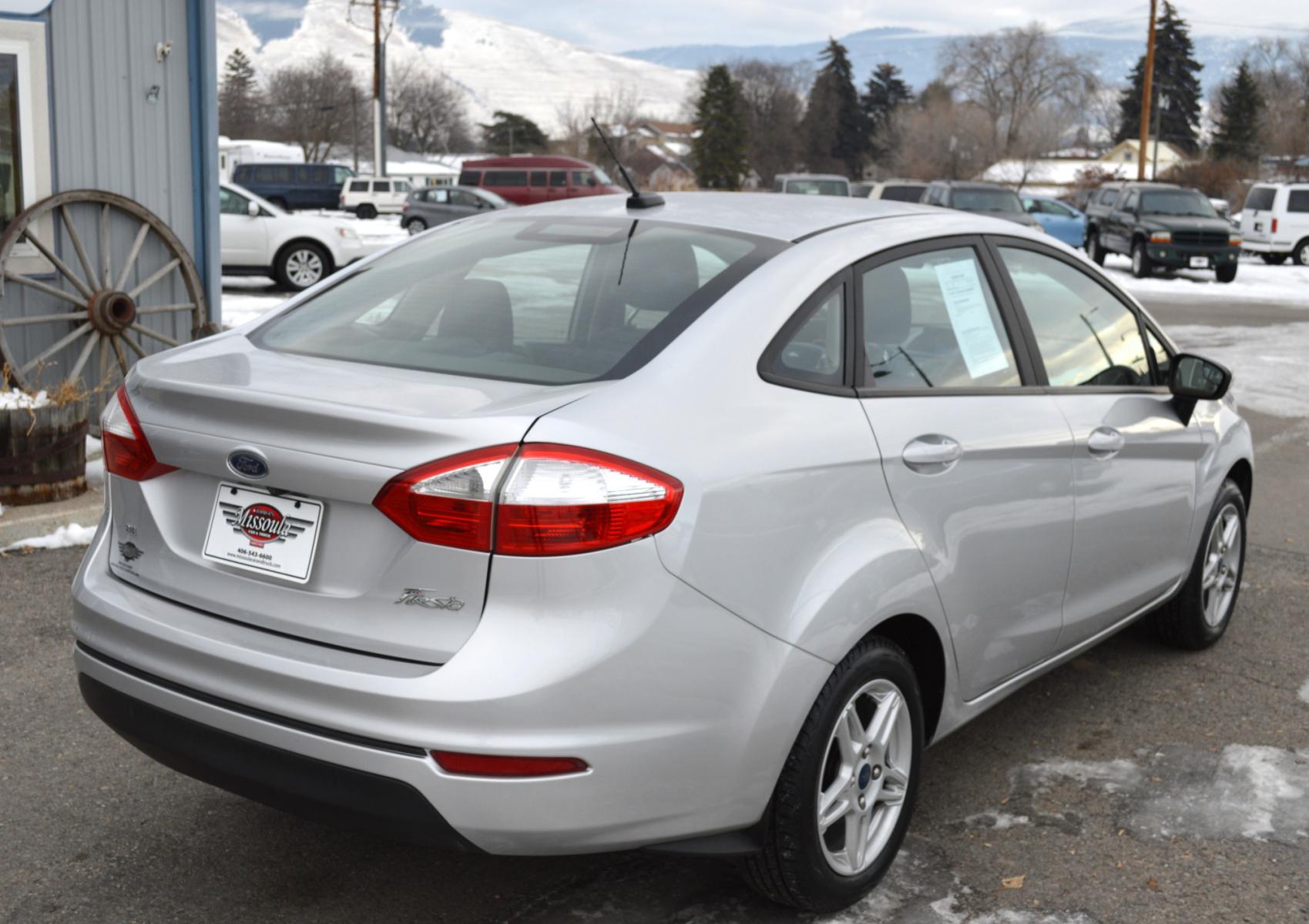 2019 Silver Ford Fiesta SE Sedan (3FADP4BJ2KM) with an 1.6L L4 DOHC 16V engine, Automatic transmission, located at 450 N Russell, Missoula, MT, 59801, (406) 543-6600, 46.874496, -114.017433 - Great little car in Very Good Condition. Low Miles. Automatic Transmission. Air Conditioning. Heated Seats. Power Windows. Cruise. Tilt. Backup Camera. - Photo #1