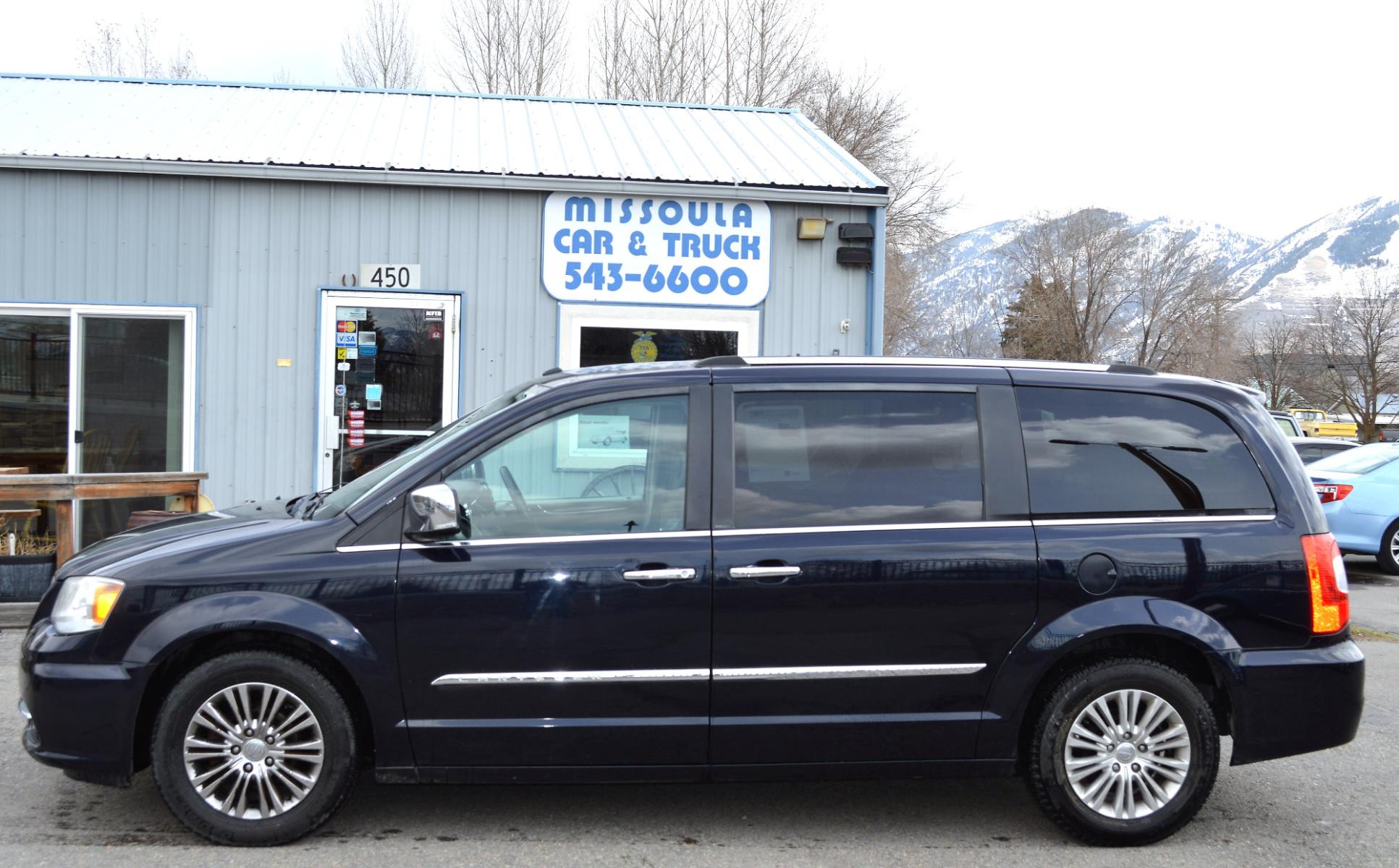 2011 Blue /Black Chrysler Town & Country Limited (2A4RR6DG6BR) with an 3.6L V6 DOHC 24V engine, 6-Speed Automatic transmission, located at 450 N Russell, Missoula, MT, 59801, (406) 543-6600, 46.874496, -114.017433 - Beautiful Van. 3rd Row Seating. Leather Seats. Rear Entertainment. Power Sliding Doors on both sides. Air. Cruise. Tilt. Navigation. Bluetooth. Stow and Go Seats. Heated Seats. Heated Steering Wheel. - Photo #0