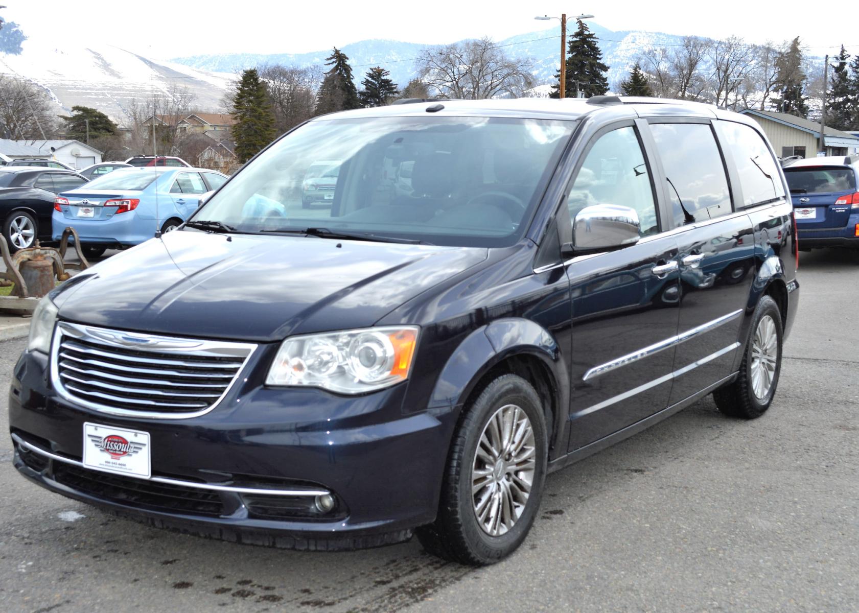 2011 Blue /Black Chrysler Town & Country Limited (2A4RR6DG6BR) with an 3.6L V6 DOHC 24V engine, 6-Speed Automatic transmission, located at 450 N Russell, Missoula, MT, 59801, (406) 543-6600, 46.874496, -114.017433 - Beautiful Van. 3rd Row Seating. Leather Seats. Rear Entertainment. Power Sliding Doors on both sides. Air. Cruise. Tilt. Navigation. Bluetooth. Stow and Go Seats. Heated Seats. Heated Steering Wheel. - Photo #1