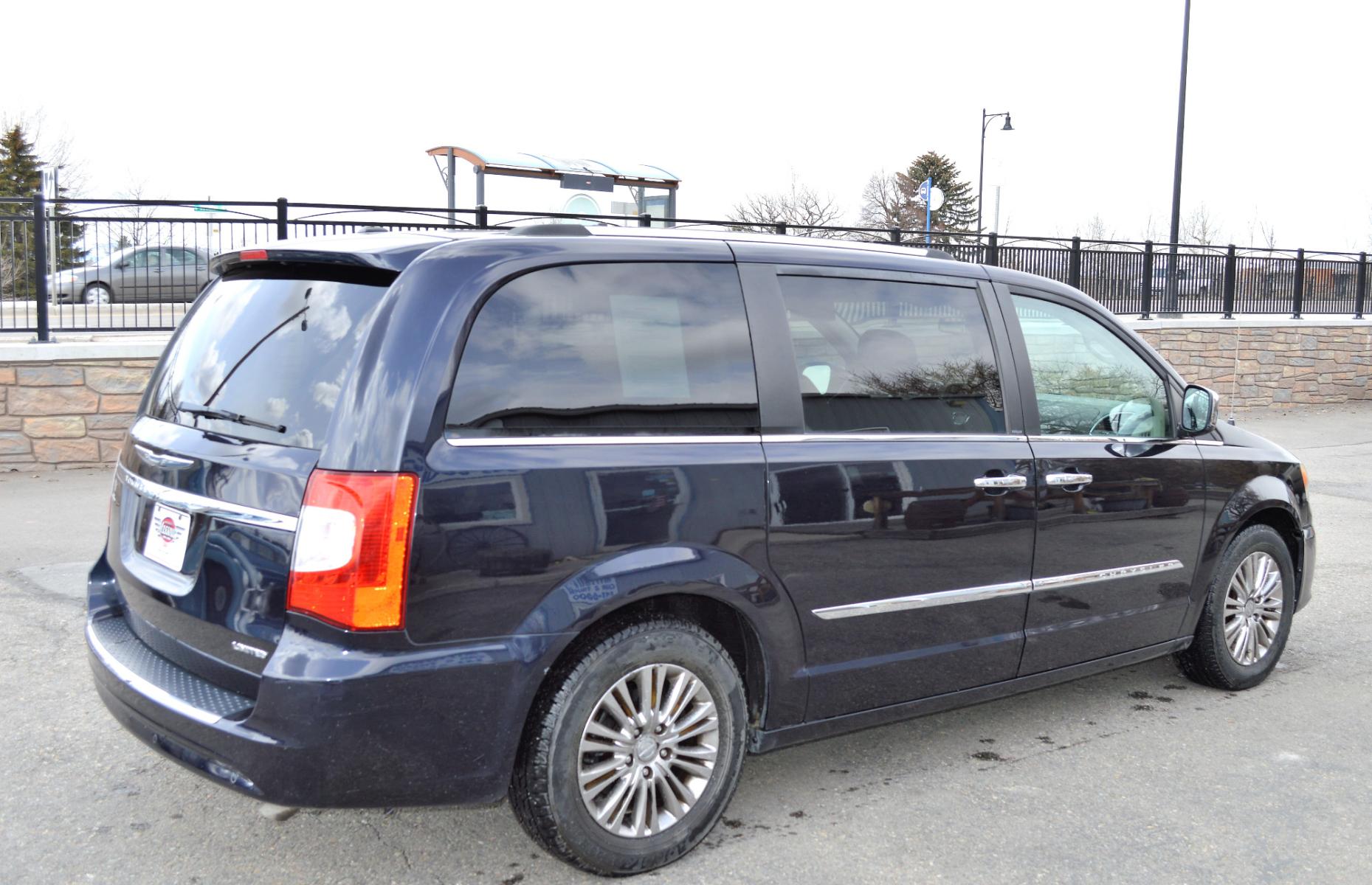 2011 Blue /Black Chrysler Town & Country Limited (2A4RR6DG6BR) with an 3.6L V6 DOHC 24V engine, 6-Speed Automatic transmission, located at 450 N Russell, Missoula, MT, 59801, (406) 543-6600, 46.874496, -114.017433 - Beautiful Van. 3rd Row Seating. Leather Seats. Rear Entertainment. Power Sliding Doors on both sides. Air. Cruise. Tilt. Navigation. Bluetooth. Stow and Go Seats. Heated Seats. Heated Steering Wheel. - Photo #5