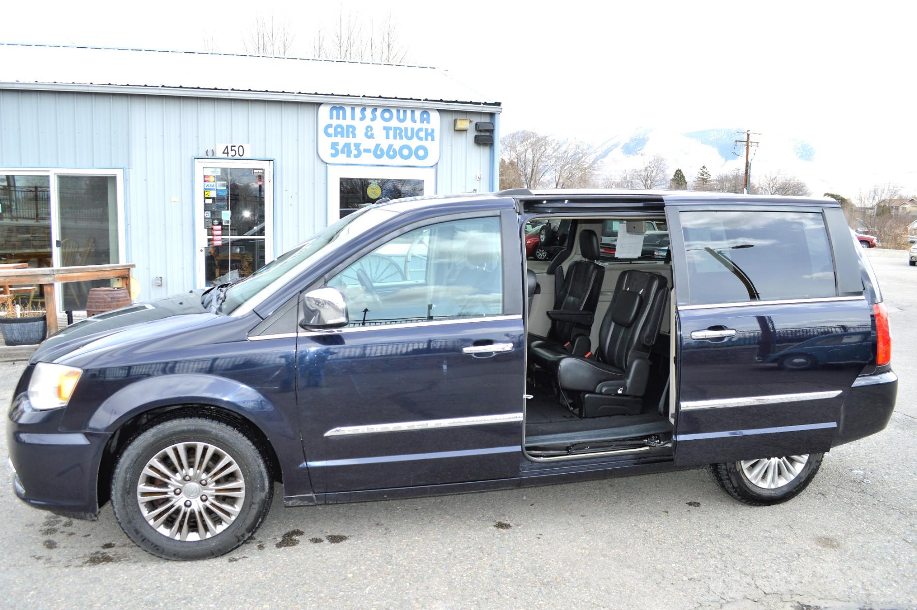 2011 Blue /Black Chrysler Town & Country Limited (2A4RR6DG6BR) with an 3.6L V6 DOHC 24V engine, 6-Speed Automatic transmission, located at 450 N Russell, Missoula, MT, 59801, (406) 543-6600, 46.874496, -114.017433 - Beautiful Van. 3rd Row Seating. Leather Seats. Rear Entertainment. Power Sliding Doors on both sides. Air. Cruise. Tilt. Navigation. Bluetooth. Stow and Go Seats. Heated Seats. Heated Steering Wheel. - Photo #9