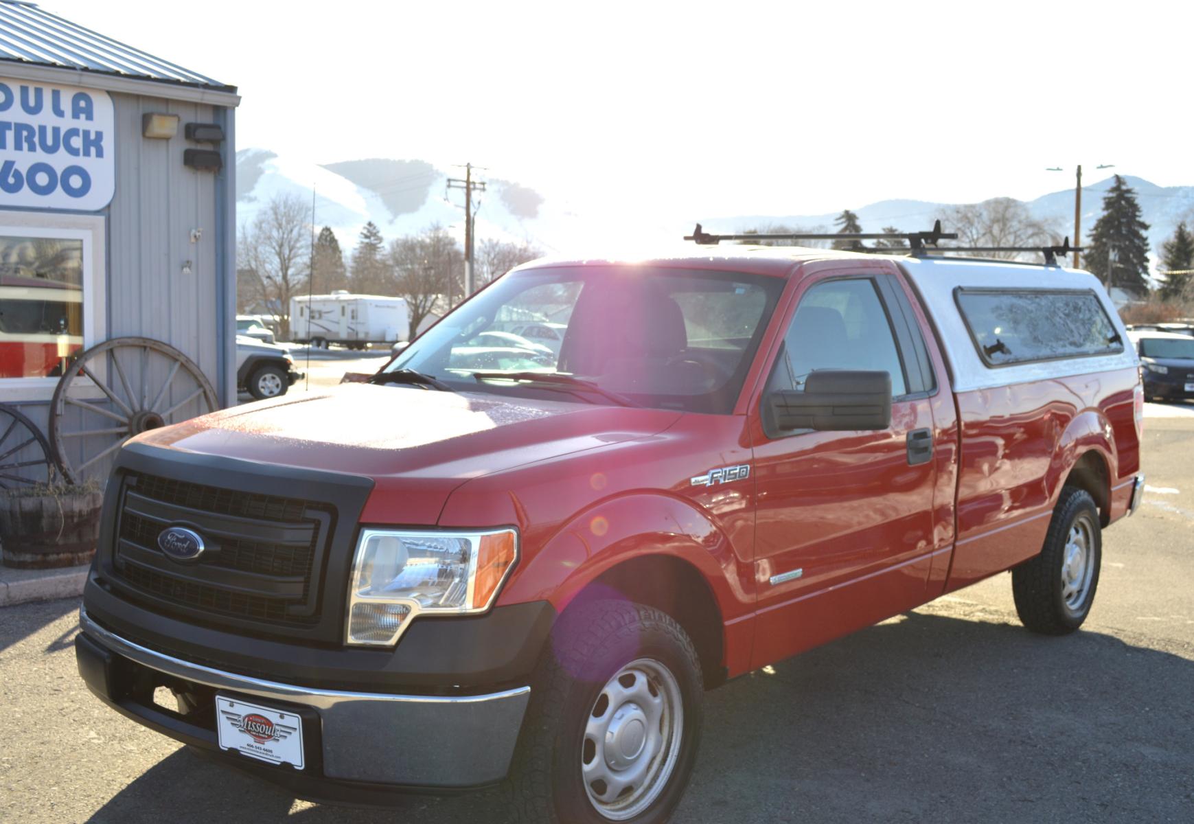 2014 Red Ford F-150 STX 6.5-ft. Bed 2WD (1FTNF1CT7EK) with an 3.5L V6 TURBO engine, 6-Speed Automatic transmission, located at 450 N Russell, Missoula, MT, 59801, (406) 543-6600, 46.874496, -114.017433 - Great Running Two Wheel Drive Truck. Automatic Transmission. Air, Cruise, Tilt. CD Player. Nice Topper. - Photo #1